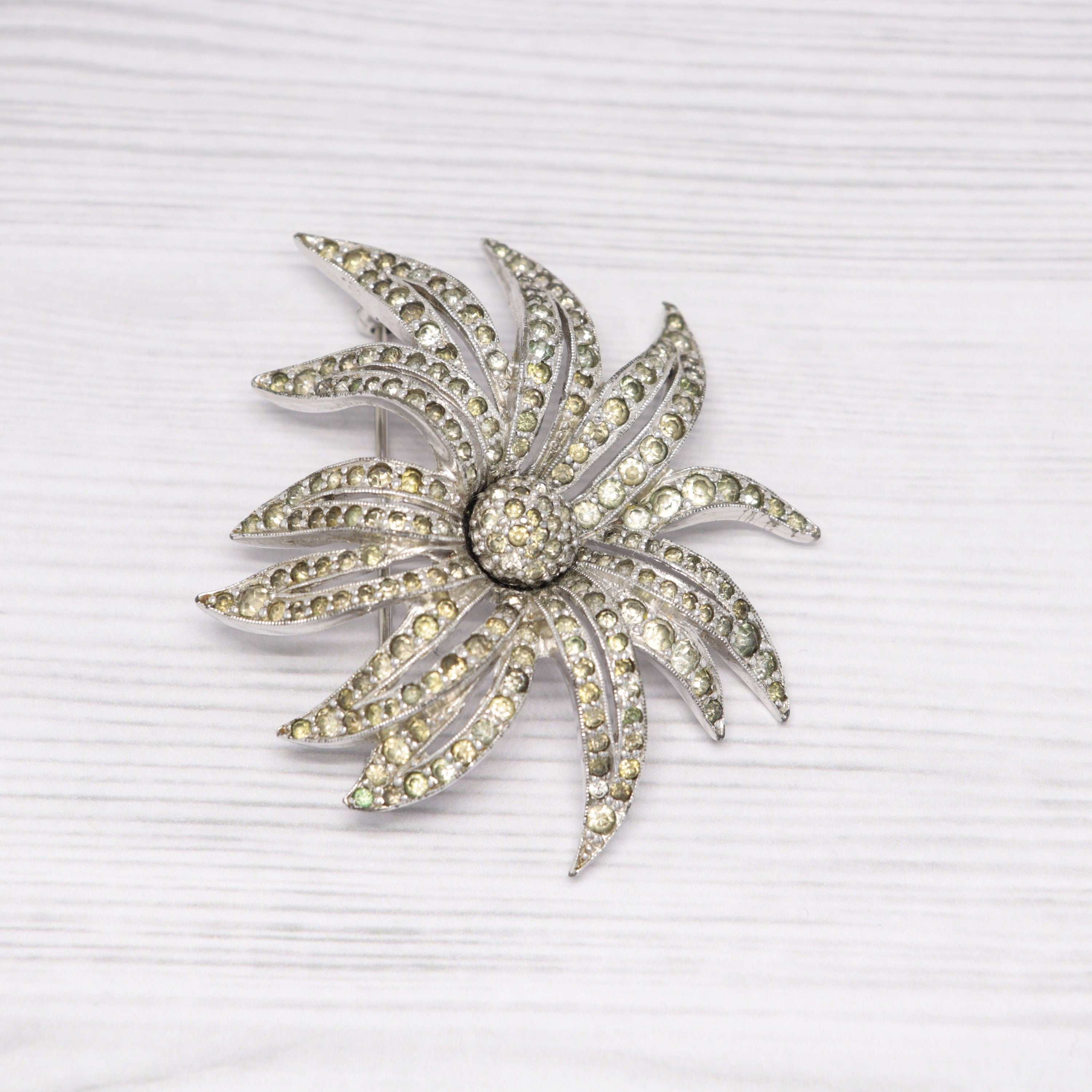 Vintage Jomaz silver-tone and rhinestone flower brooch