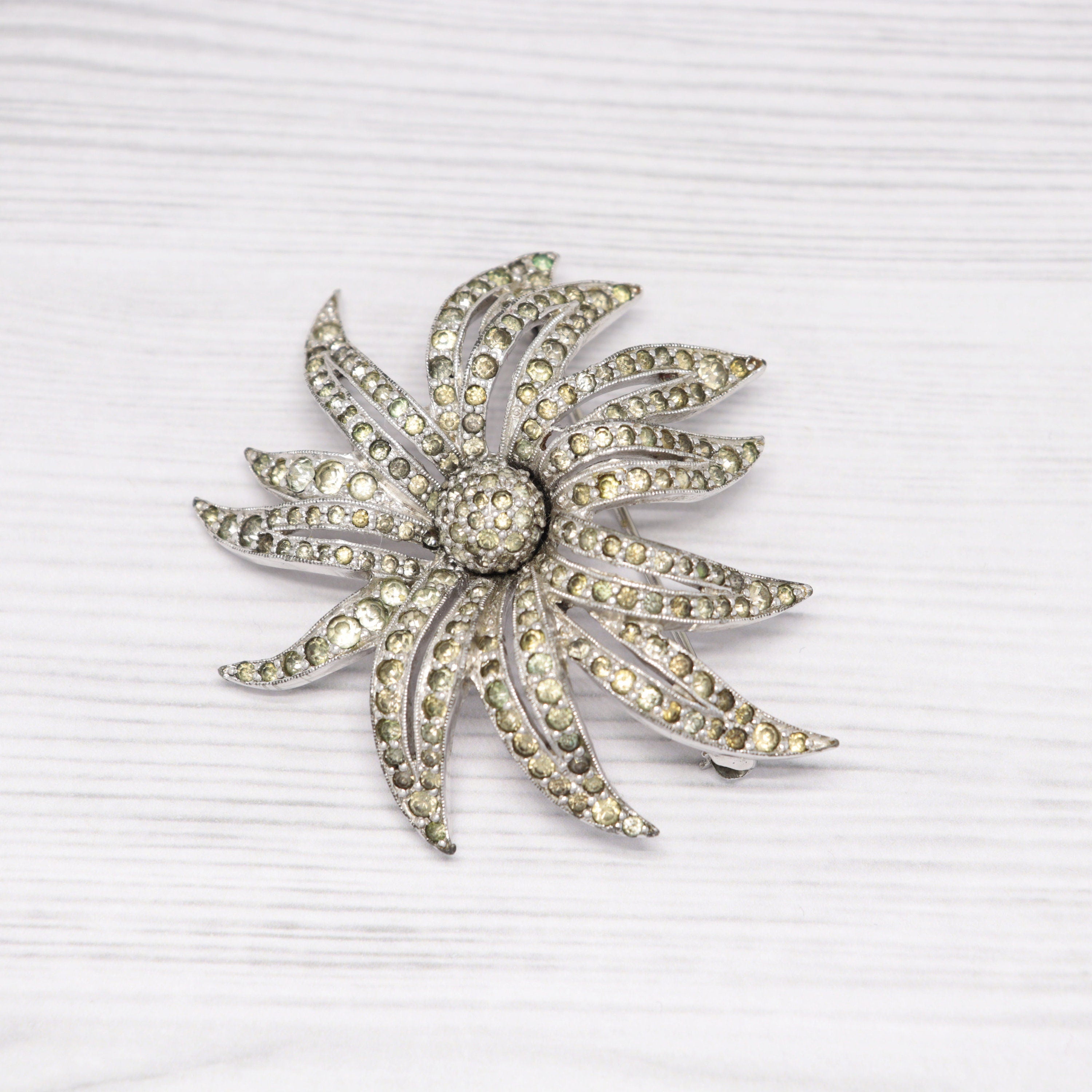 Vintage Jomaz silver-tone and rhinestone flower brooch