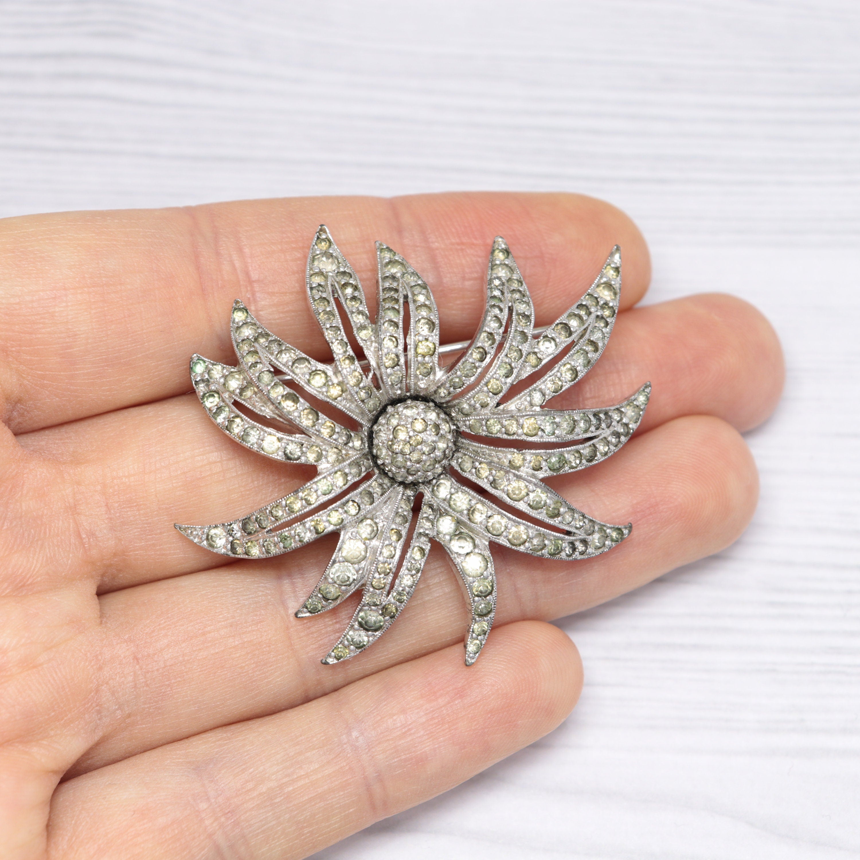 Vintage Jomaz silver-tone and rhinestone flower brooch