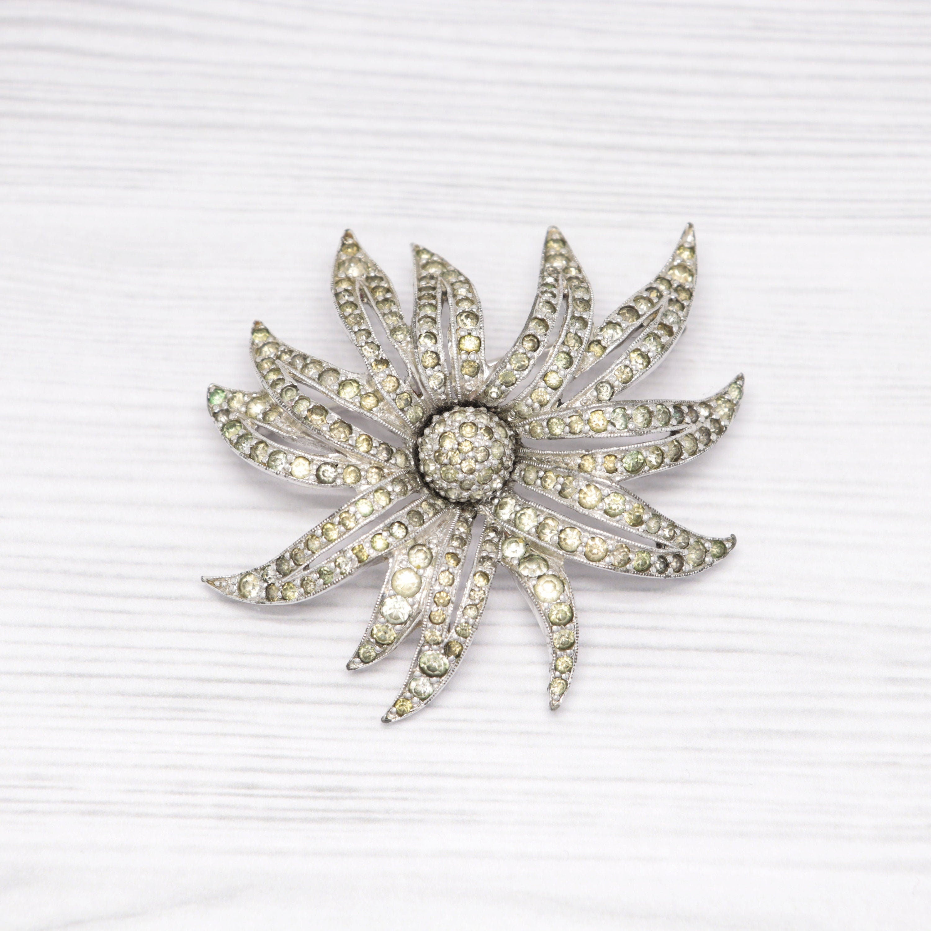 Vintage Jomaz silver-tone and rhinestone flower brooch