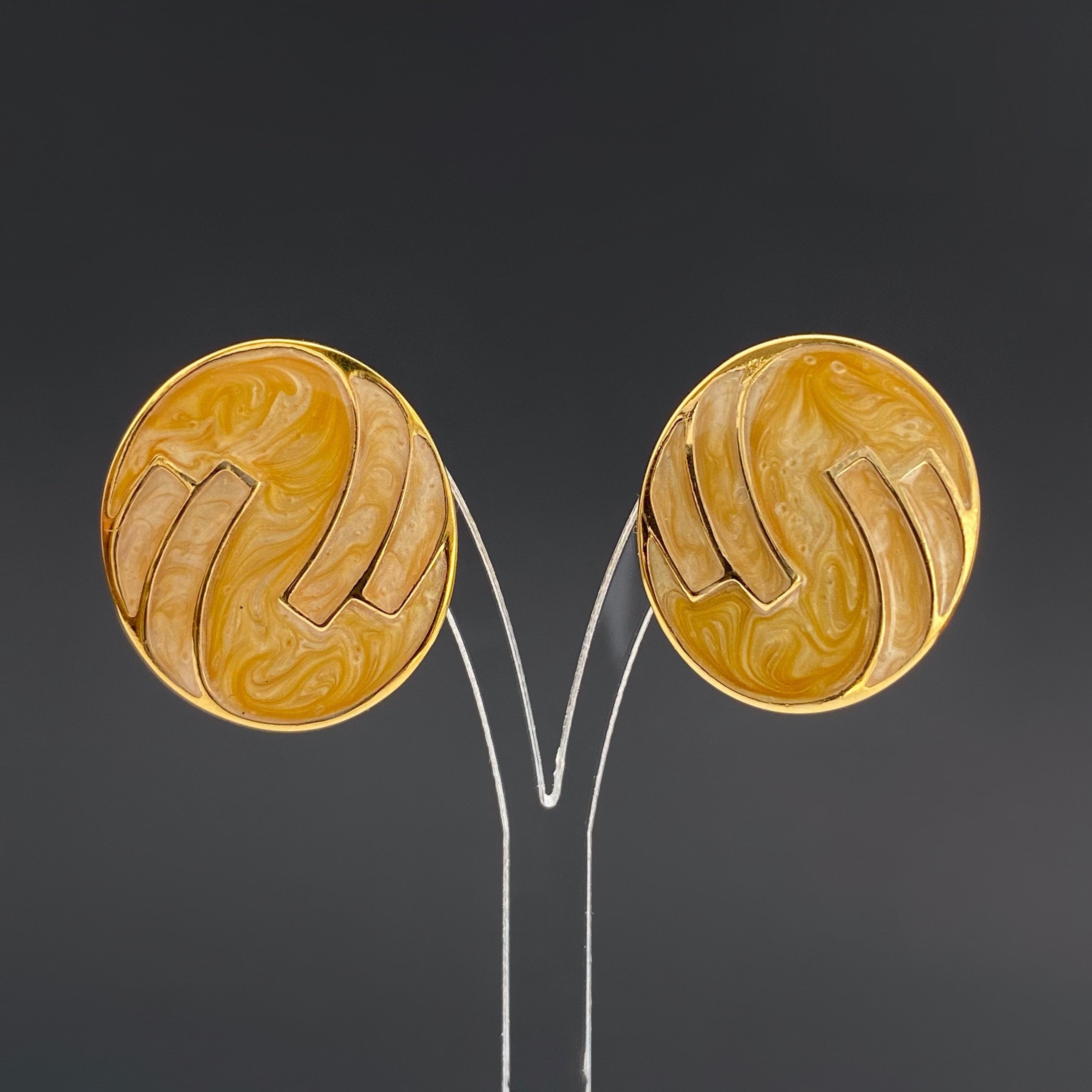 Vintage MONET Clip On Earrings: Gold Tone Beige Swirl Enamel
