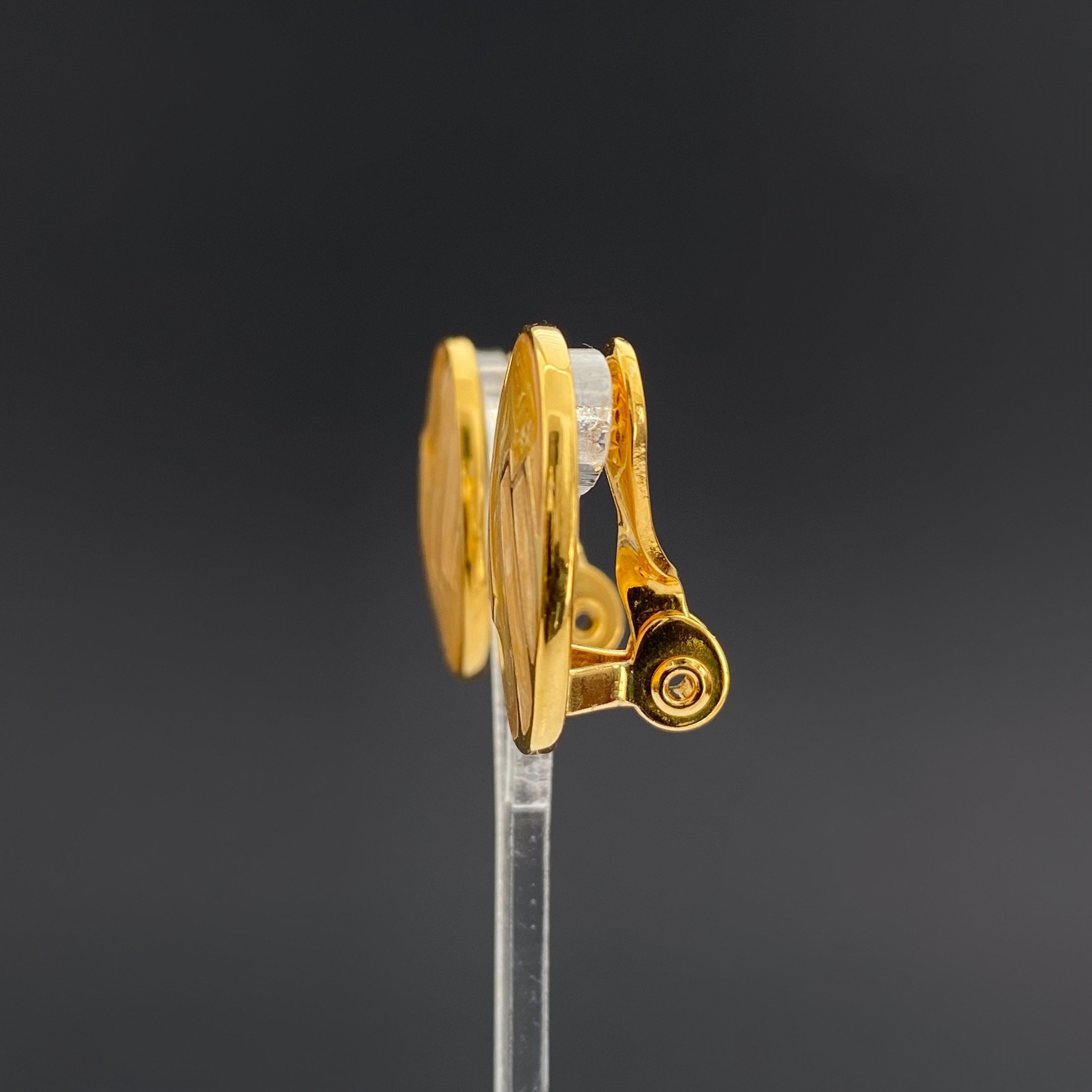 Vintage MONET Clip On Earrings: Gold Tone Beige Swirl Enamel