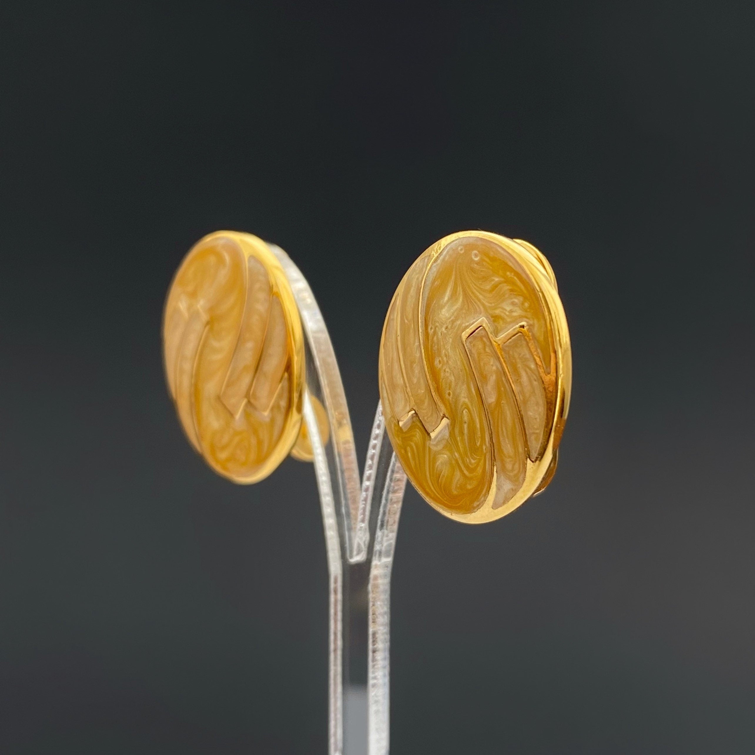 Vintage MONET Clip On Earrings: Gold Tone Beige Swirl Enamel