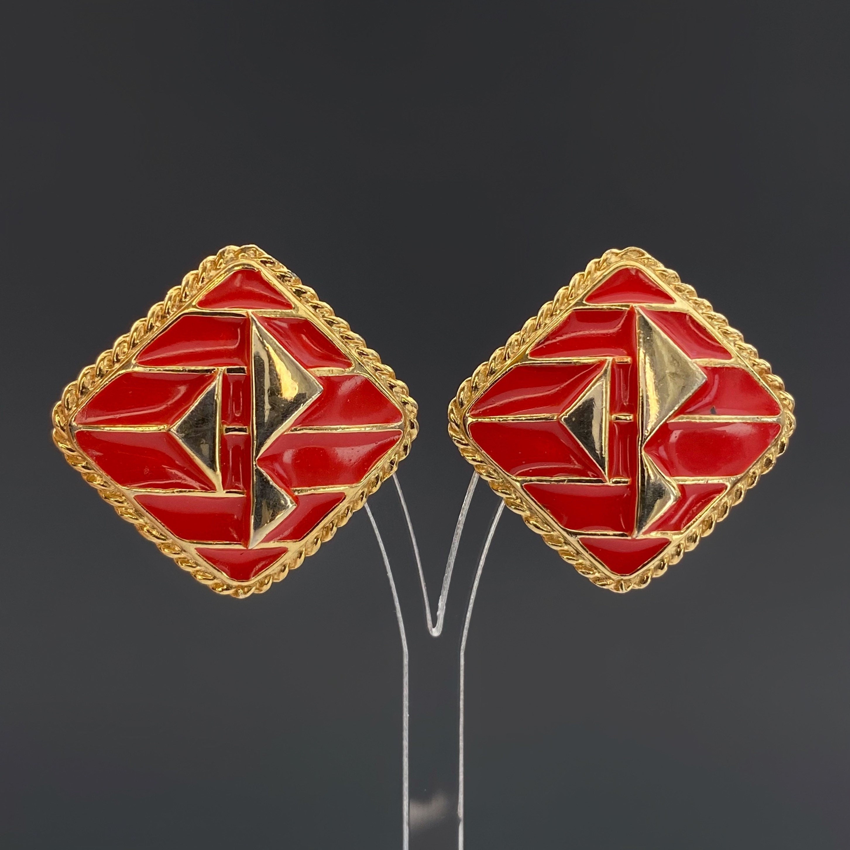 Vintage gold tone and red enamel clip on earrings