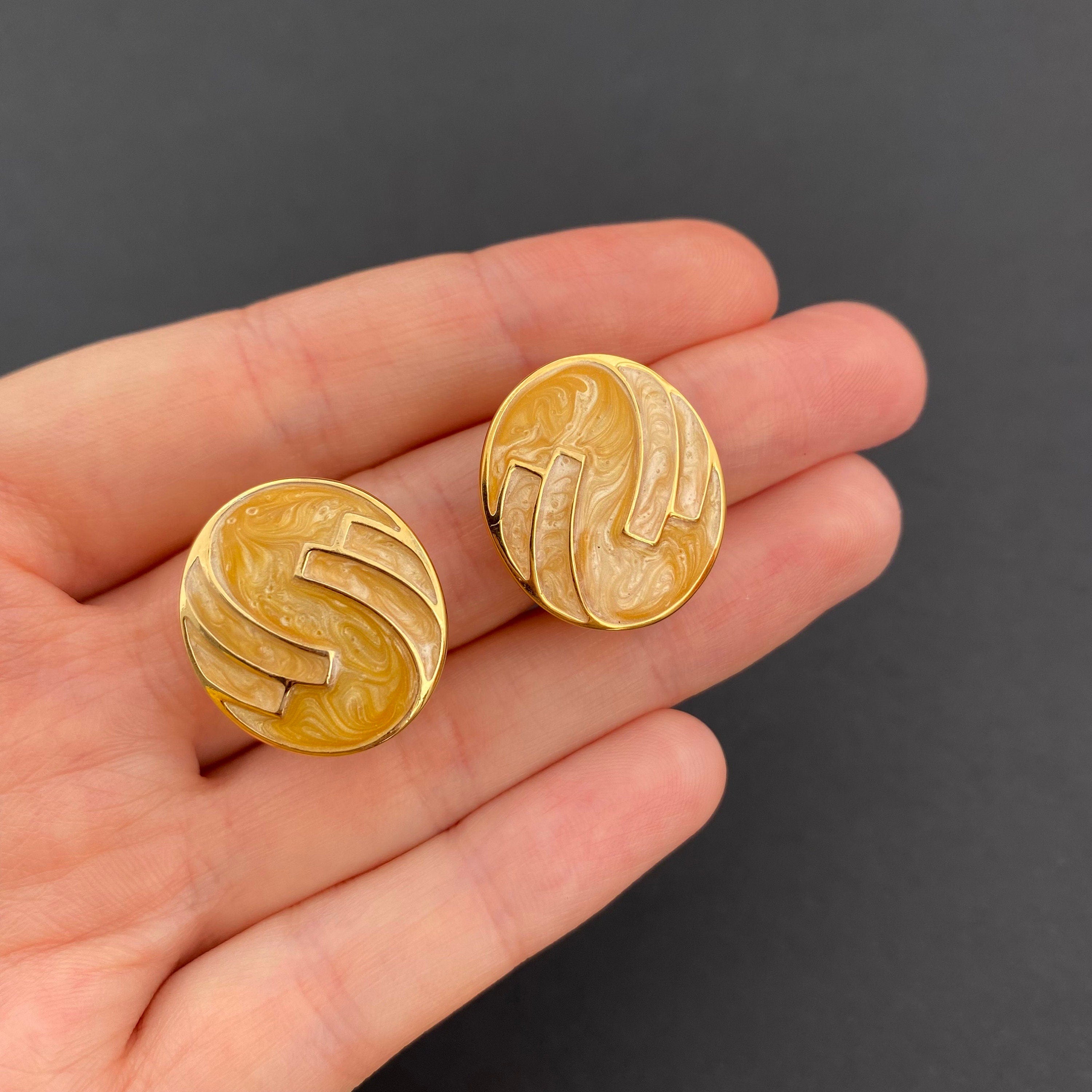 Vintage MONET Clip On Earrings: Gold Tone Beige Swirl Enamel