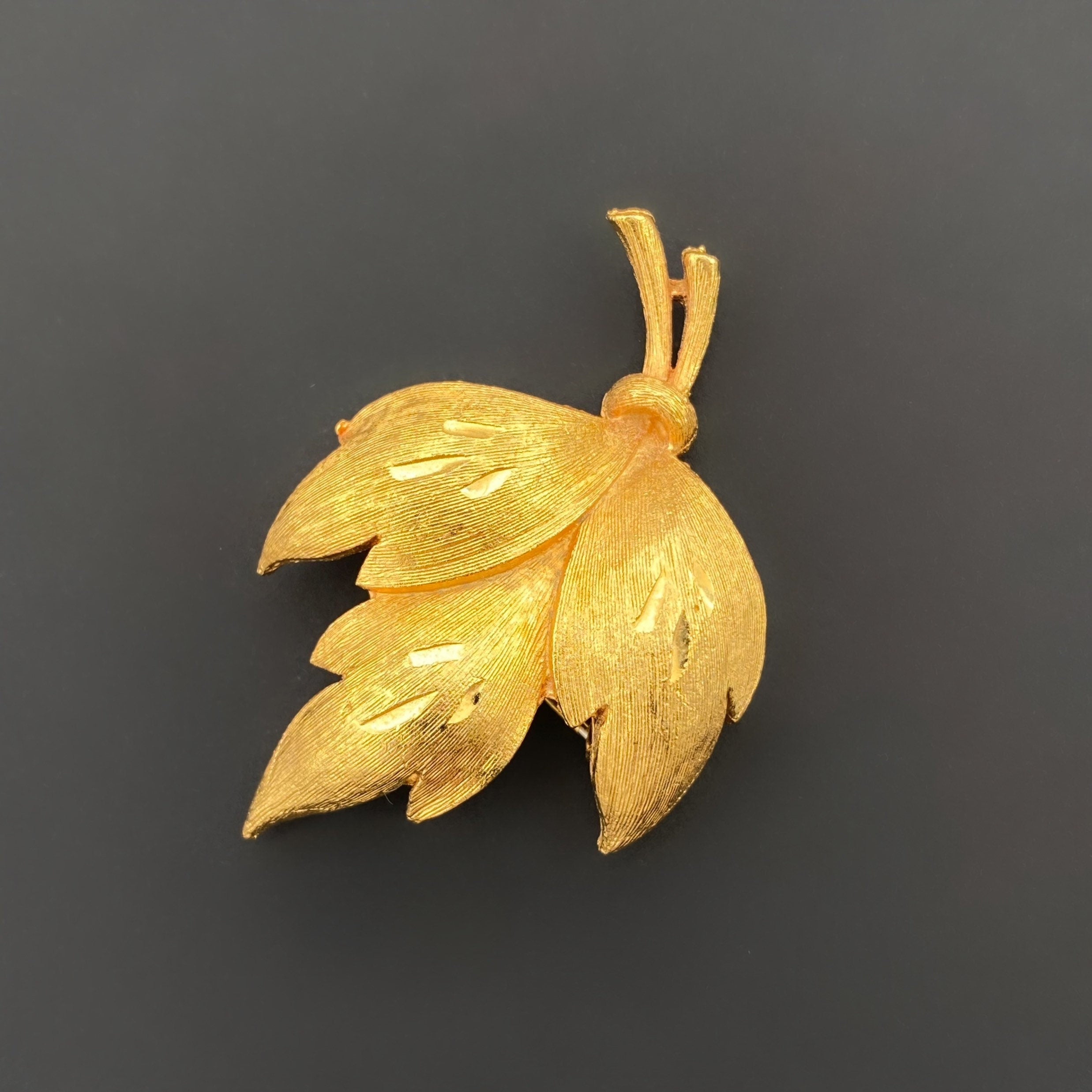 Vintage JJ gold tone leaf brooch