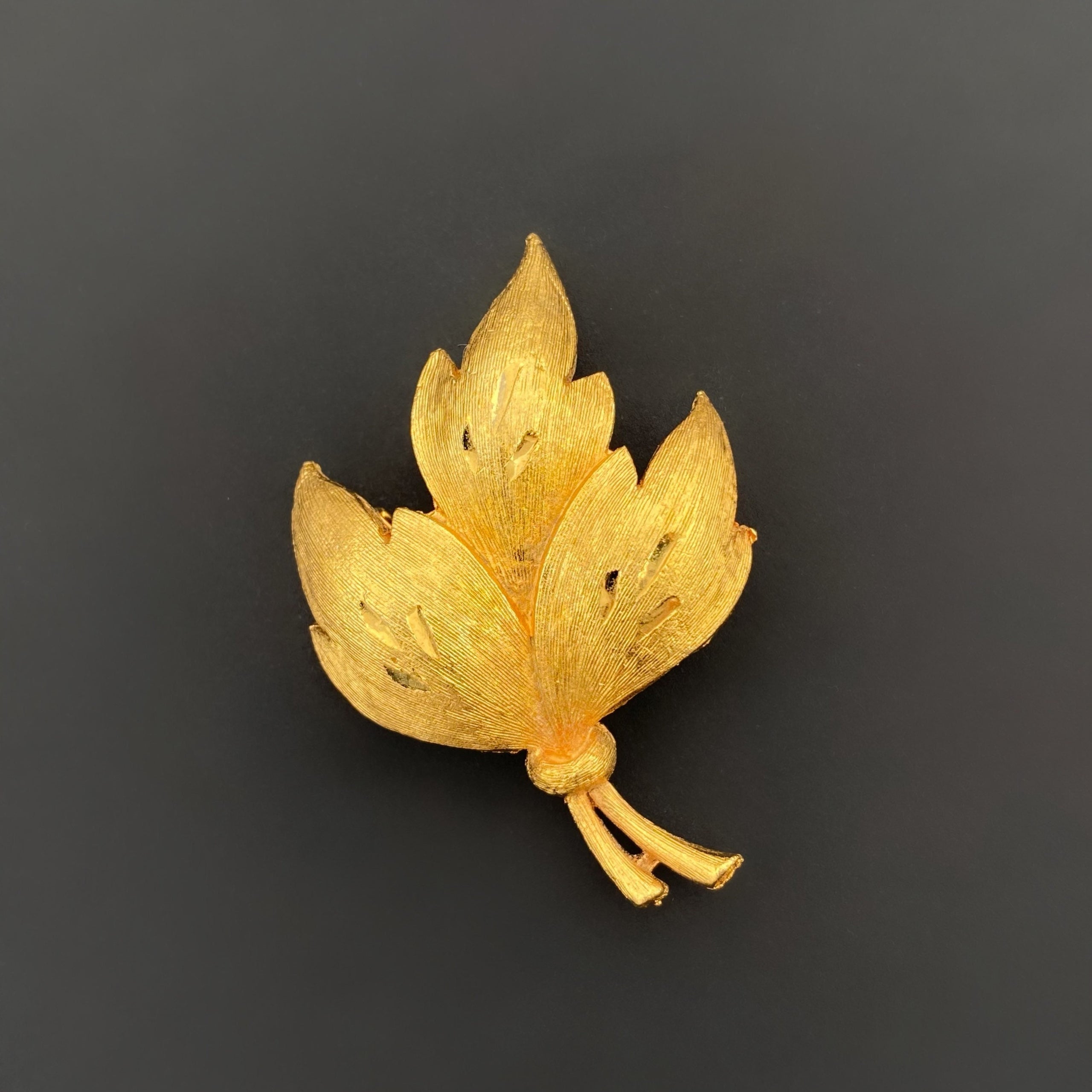 Vintage JJ gold tone leaf brooch