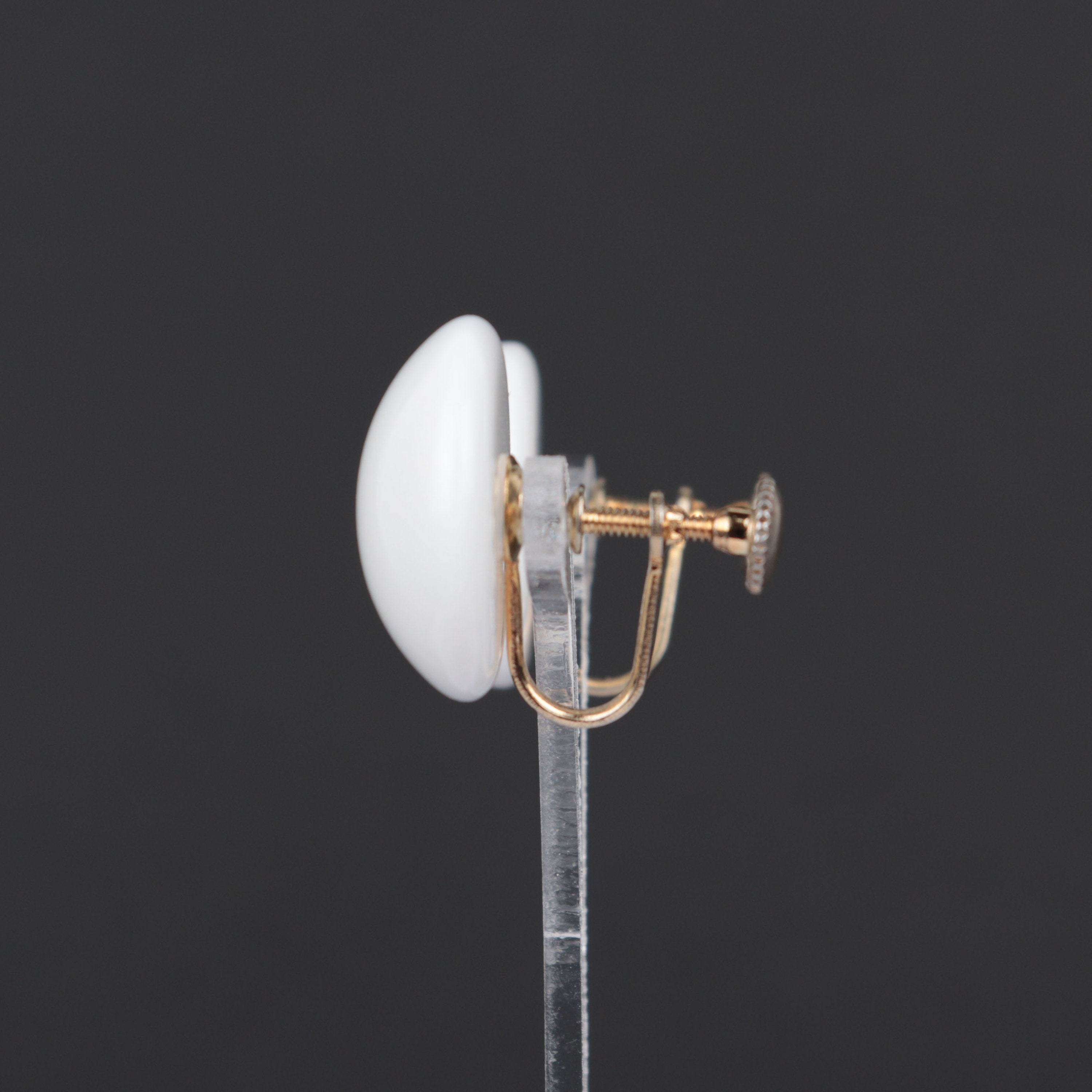 Vintage white plastic circle screw back earrings