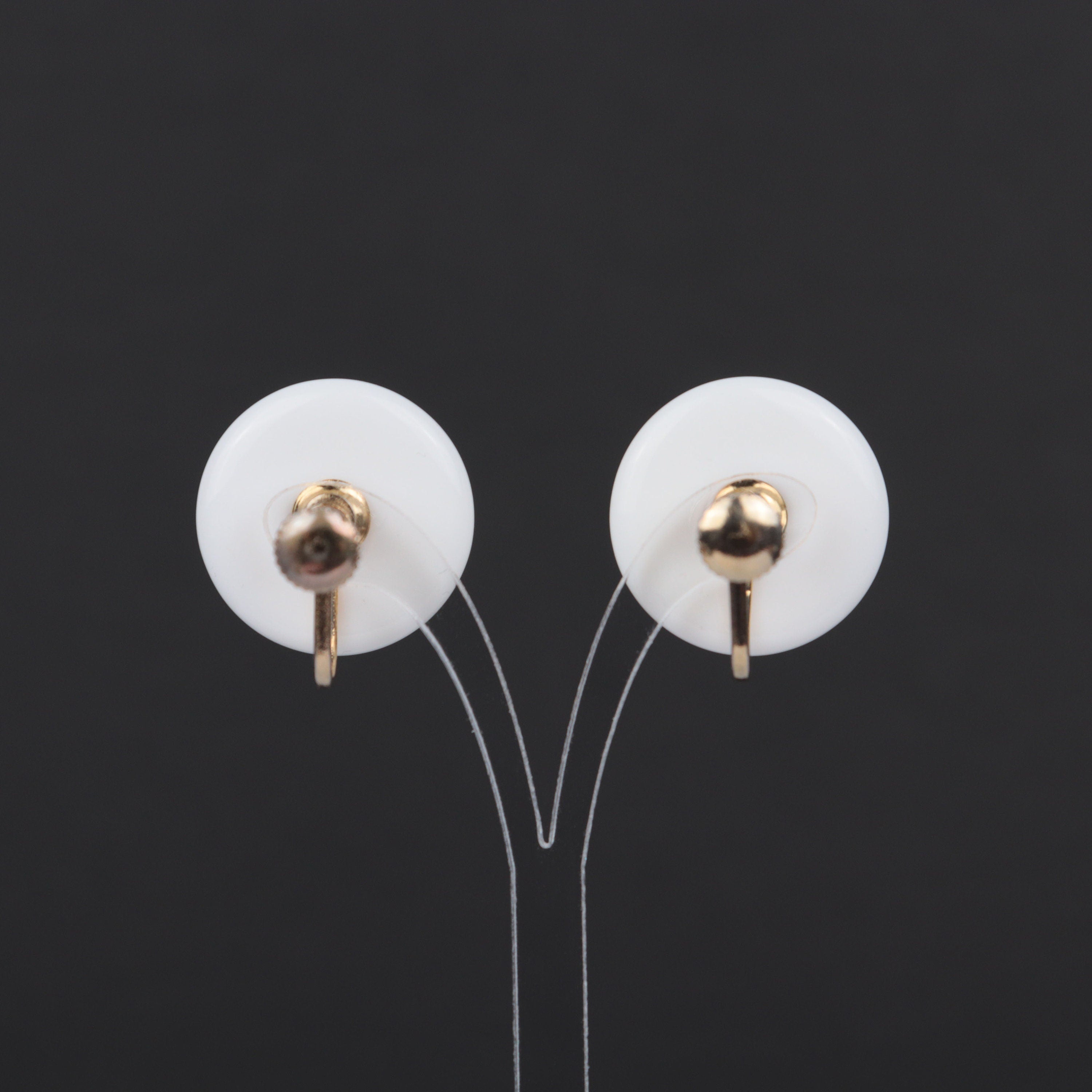 Vintage white plastic circle screw back earrings