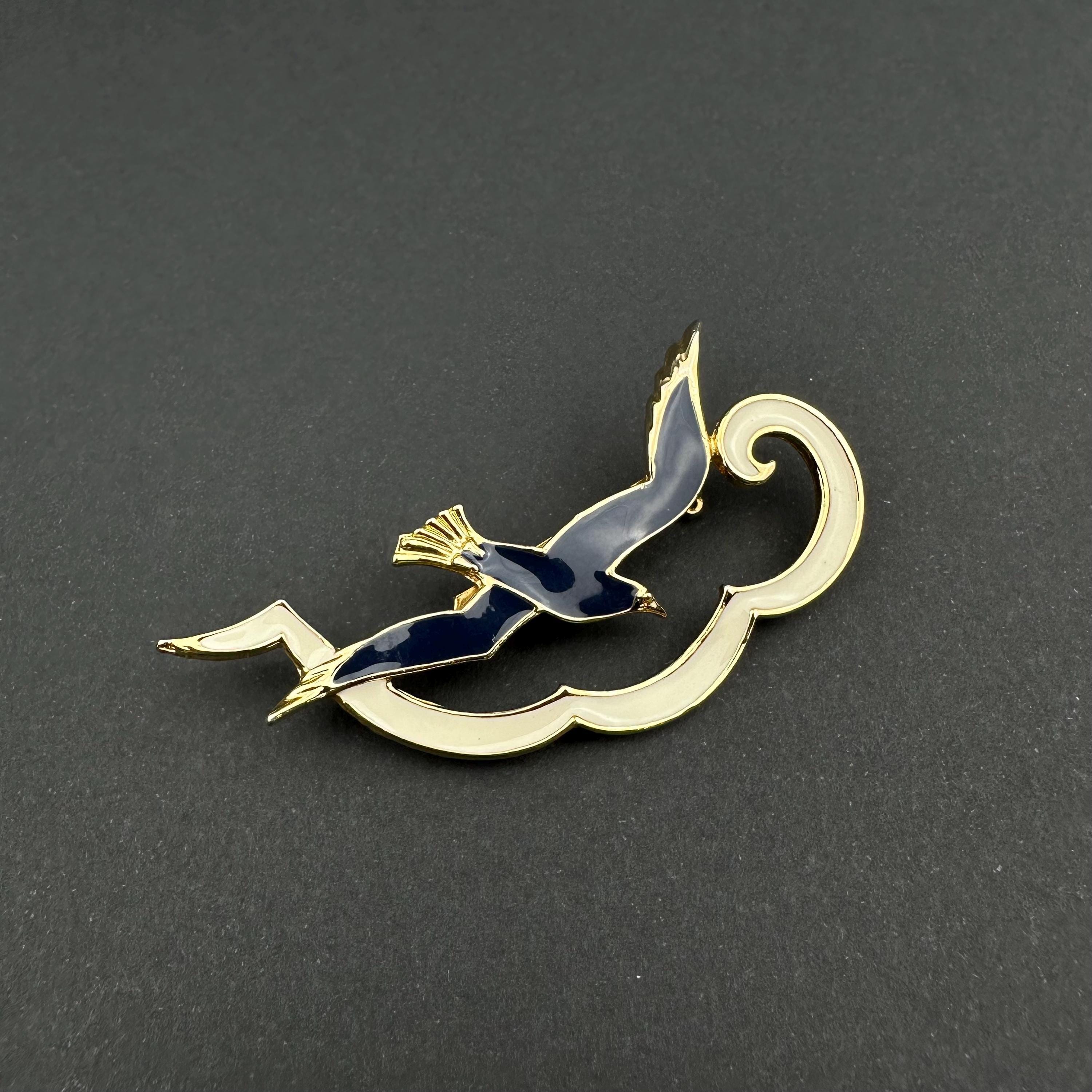 Vintage gold tone and blue enamel seagull brooch