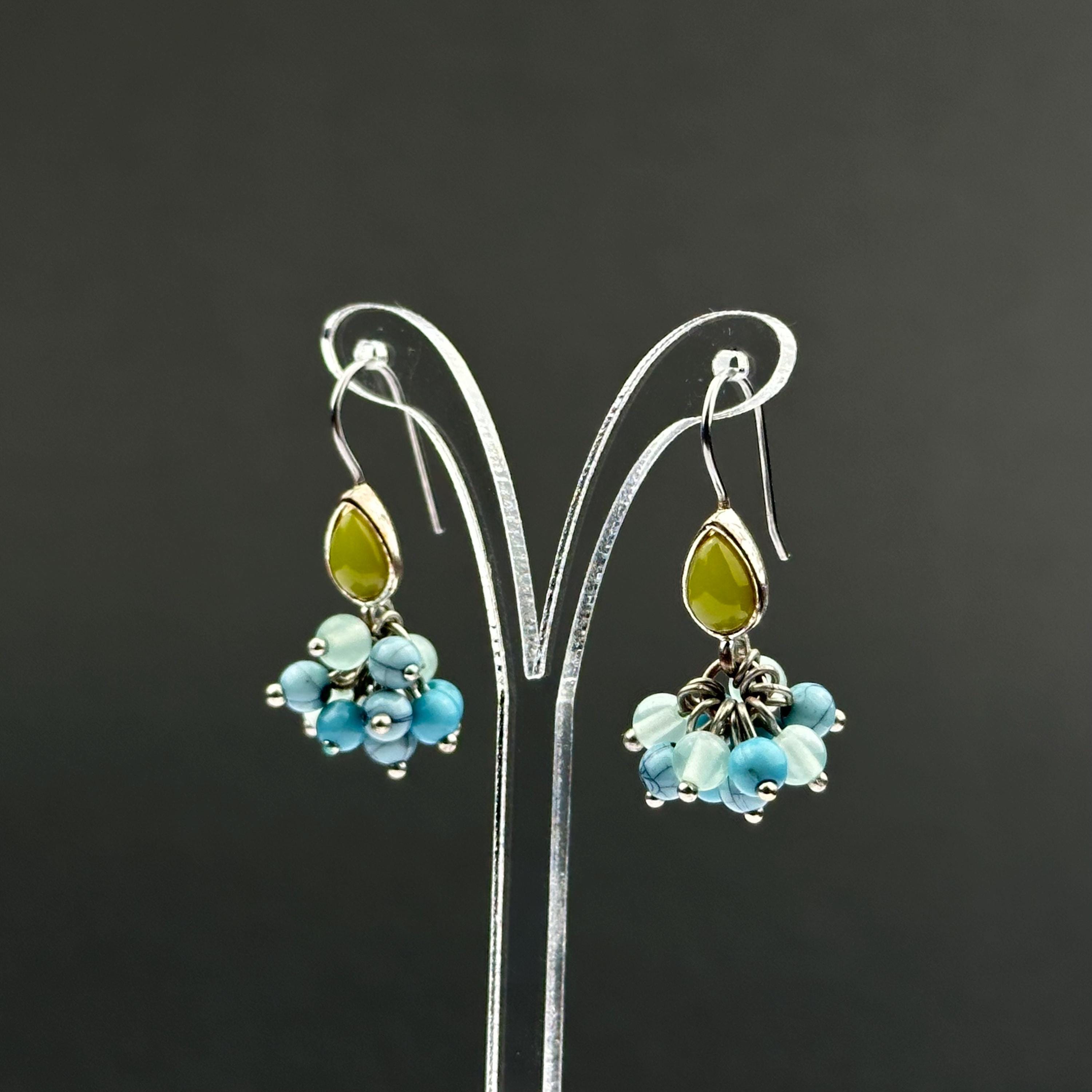 Vintage Monet drop earrings with green and blue bead