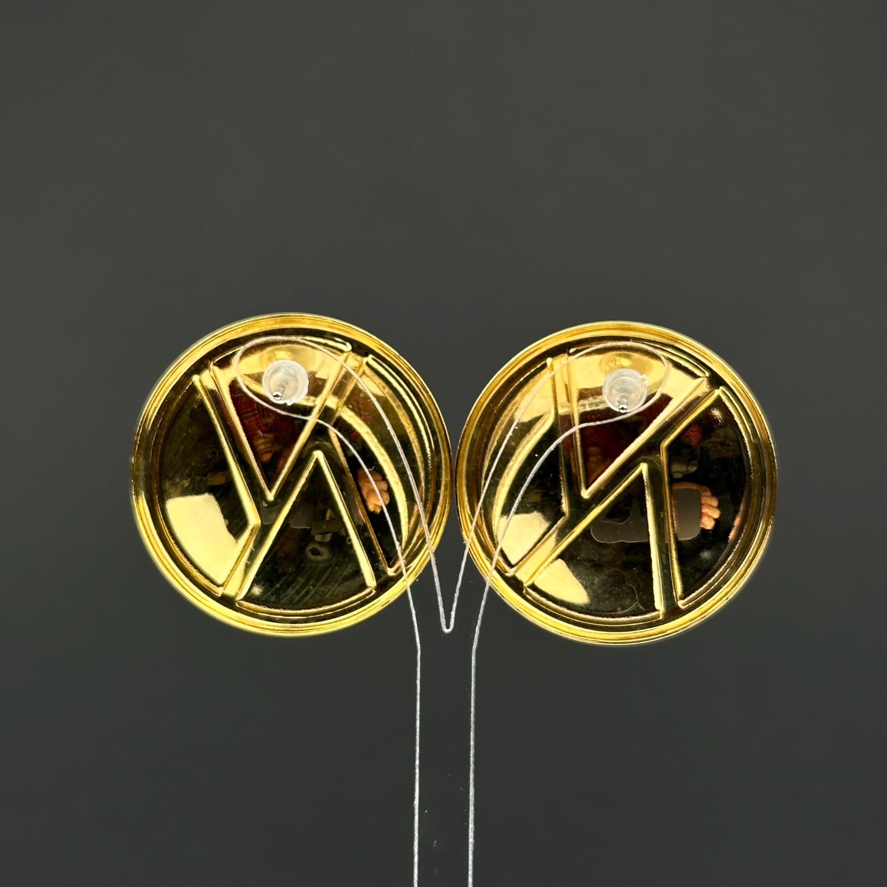 Vintage navy and cream enamel swirl round earrings