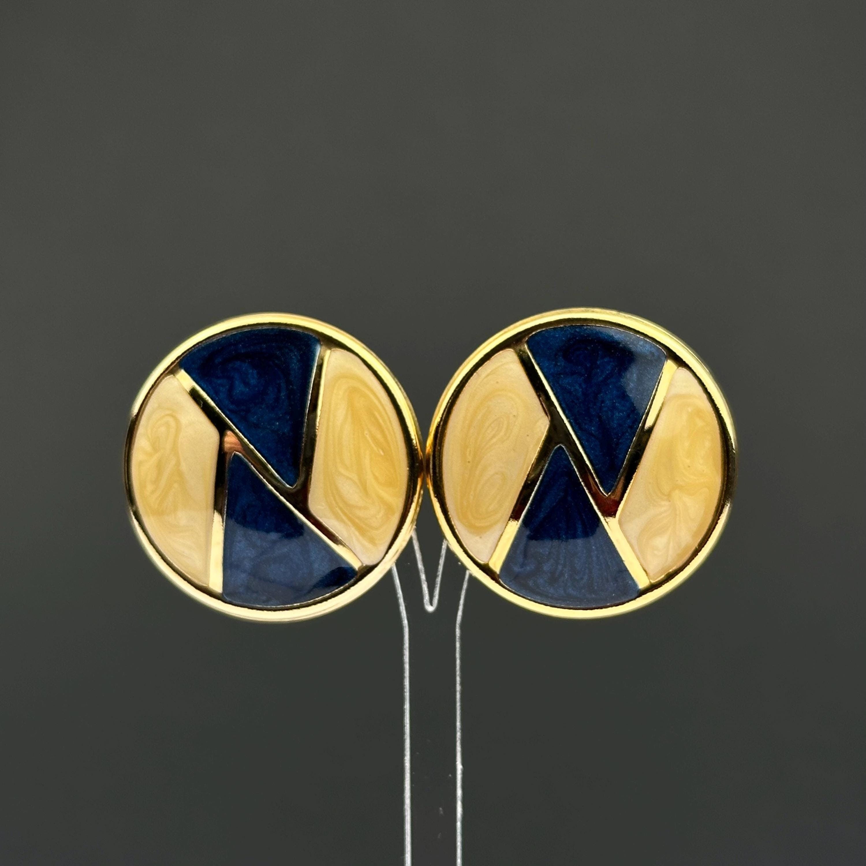 Vintage navy and cream enamel swirl round earrings