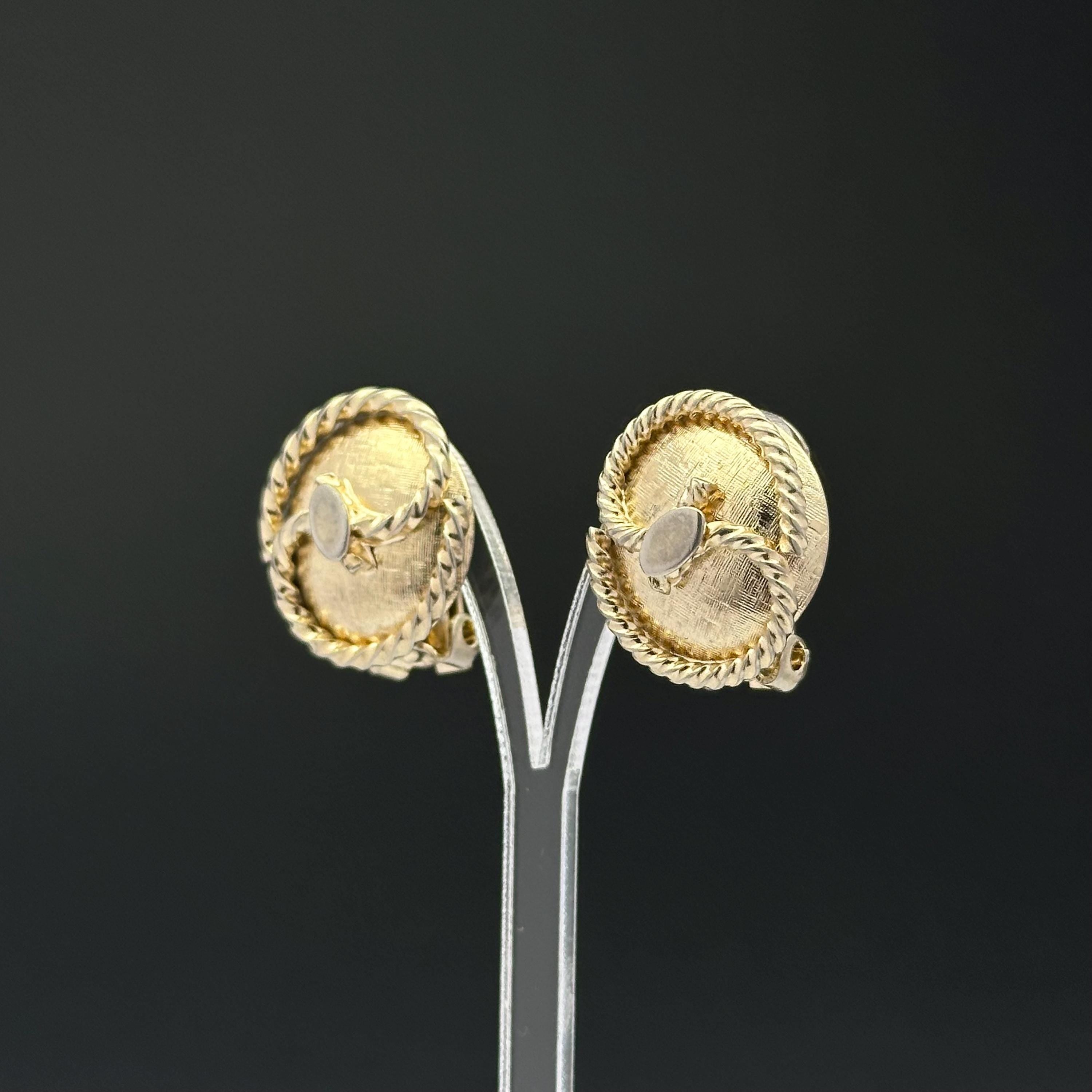 Vintage gold tone oval clip on earrings