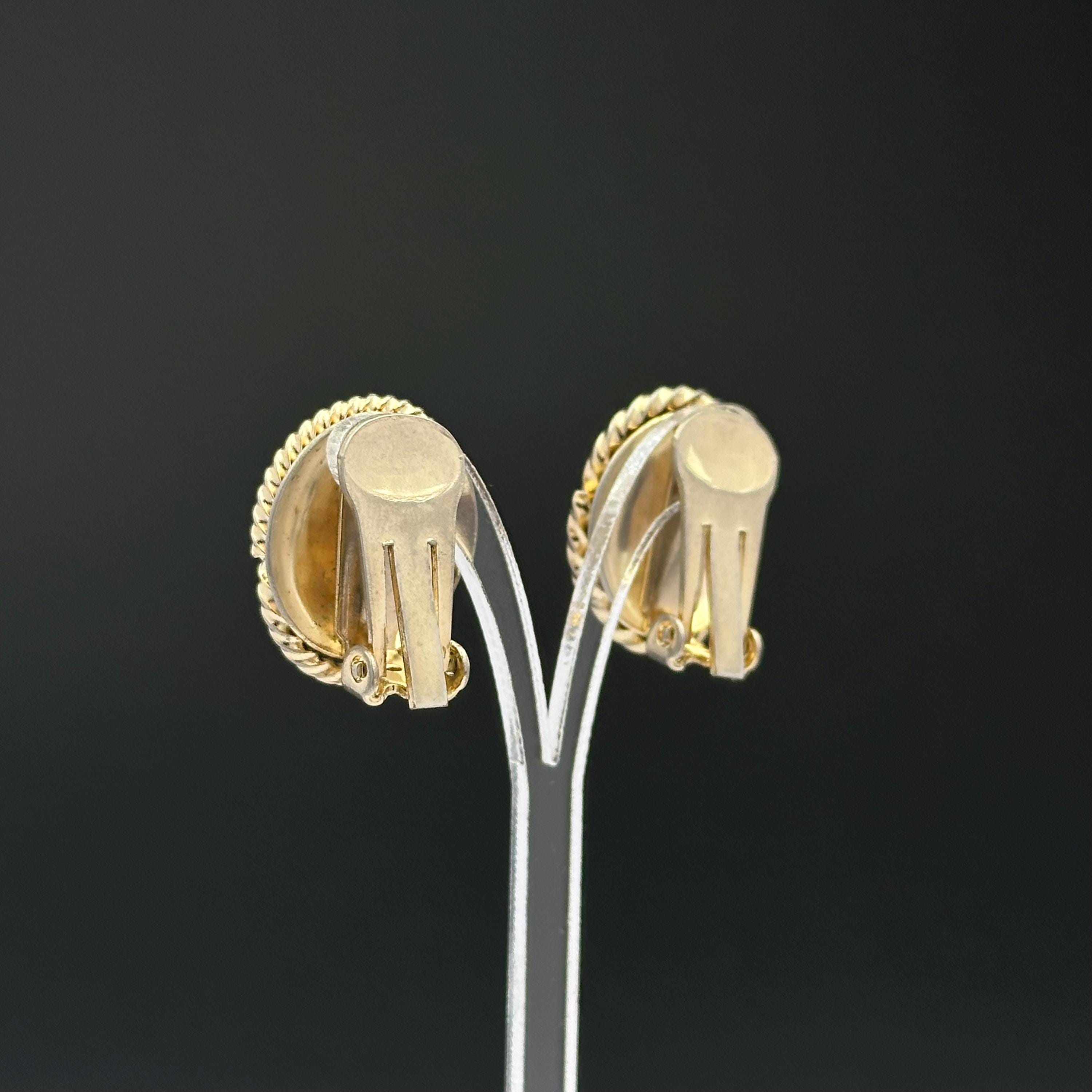 Vintage gold tone oval clip on earrings