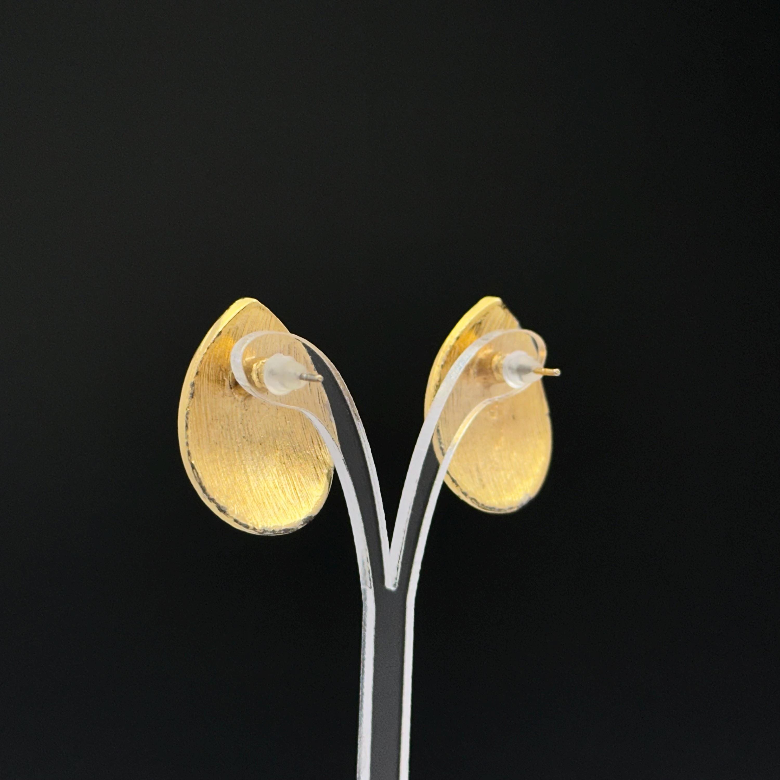 Vintage gold tone and beige swirl enamel teardrop earrings