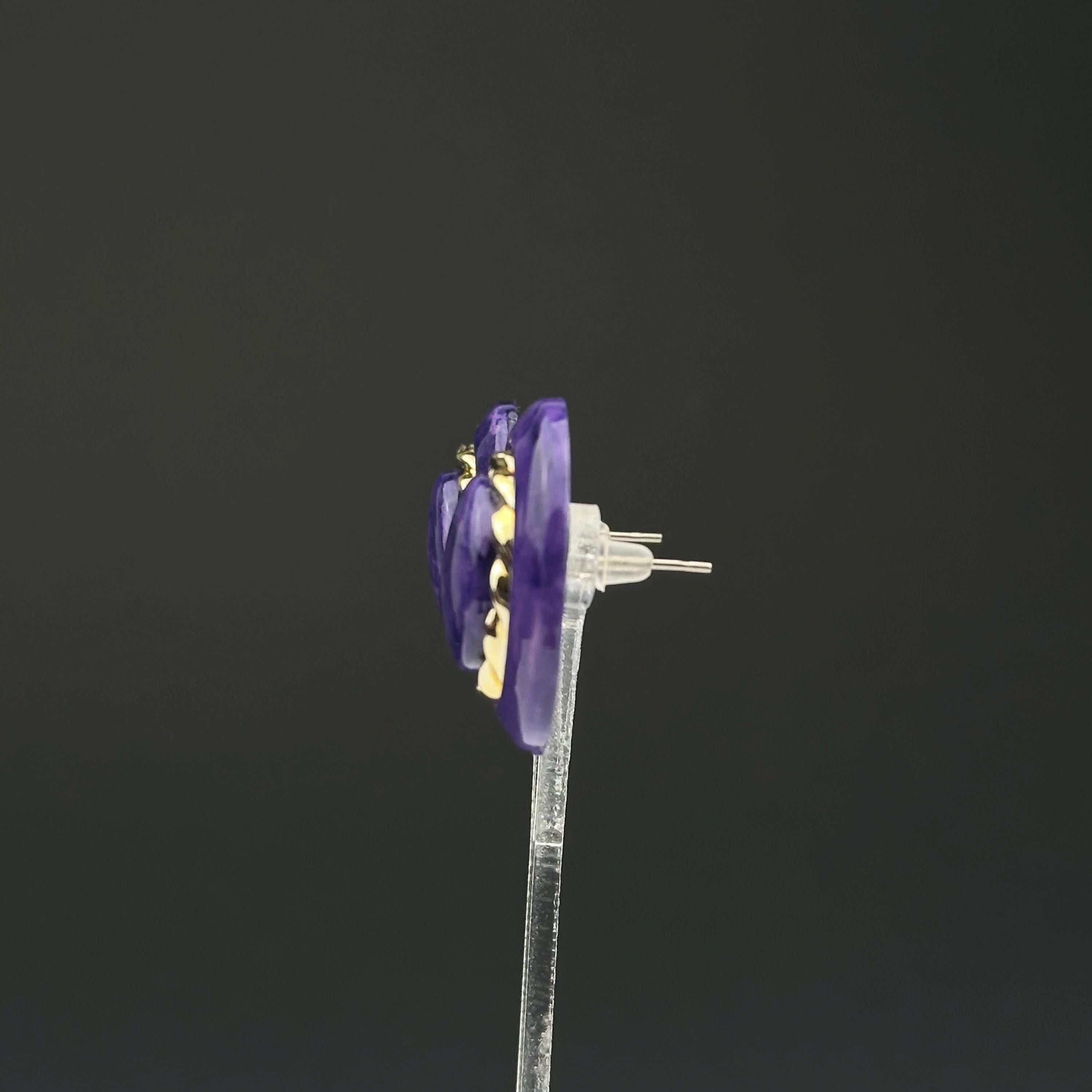 Vintage purple and gold tone plastic earrings