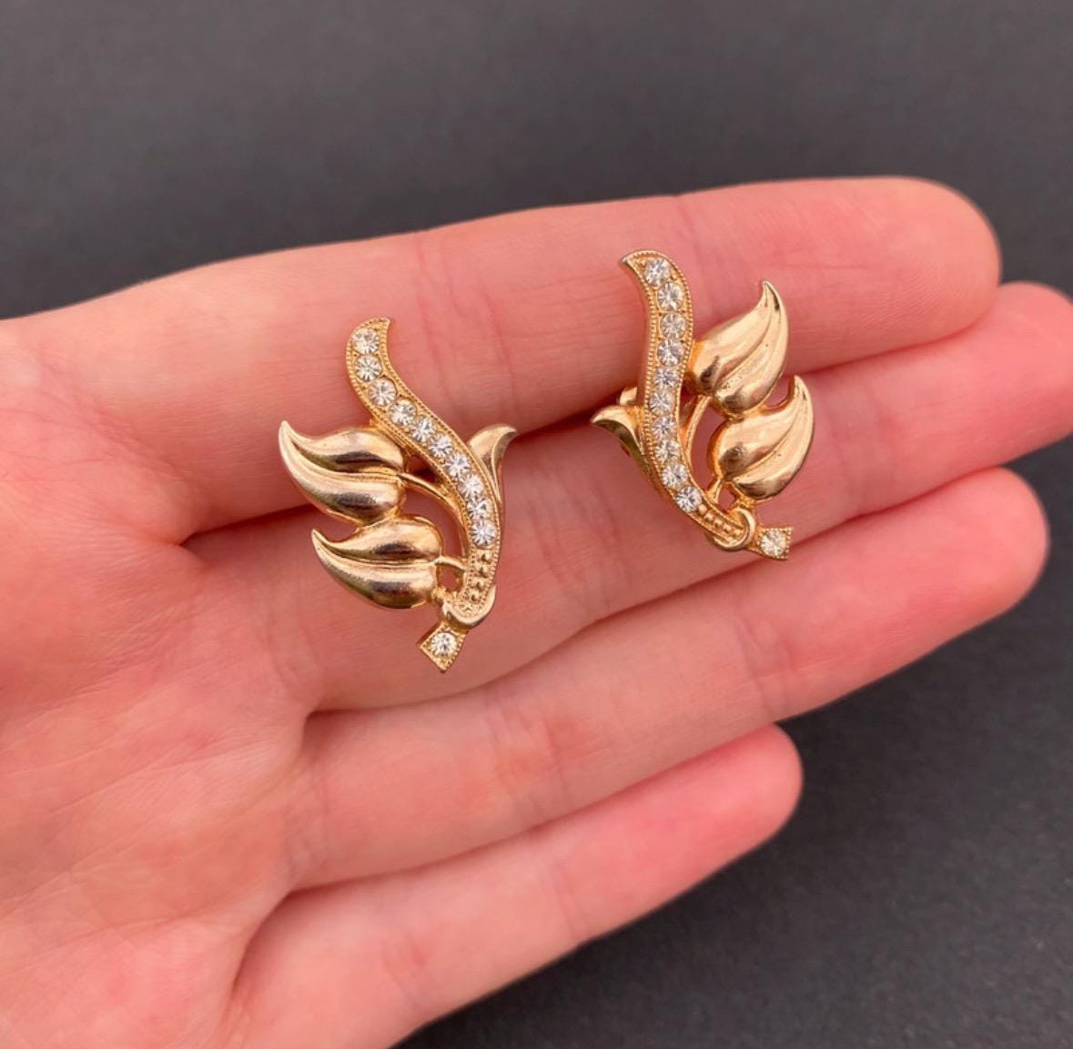 Vintage gold-tone leaf and clear rhinestones screw back earrings