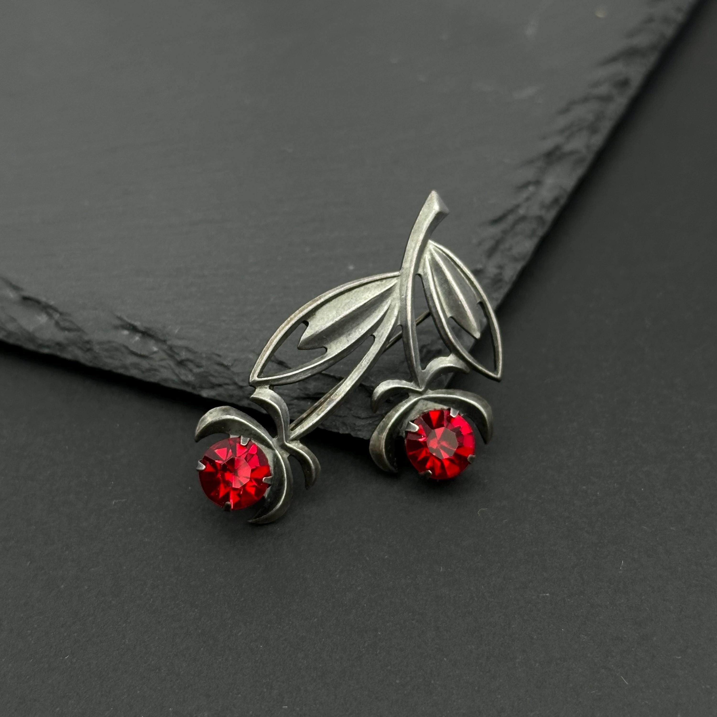 Vintage USSR silver - tone and red crystal rosebud brooch