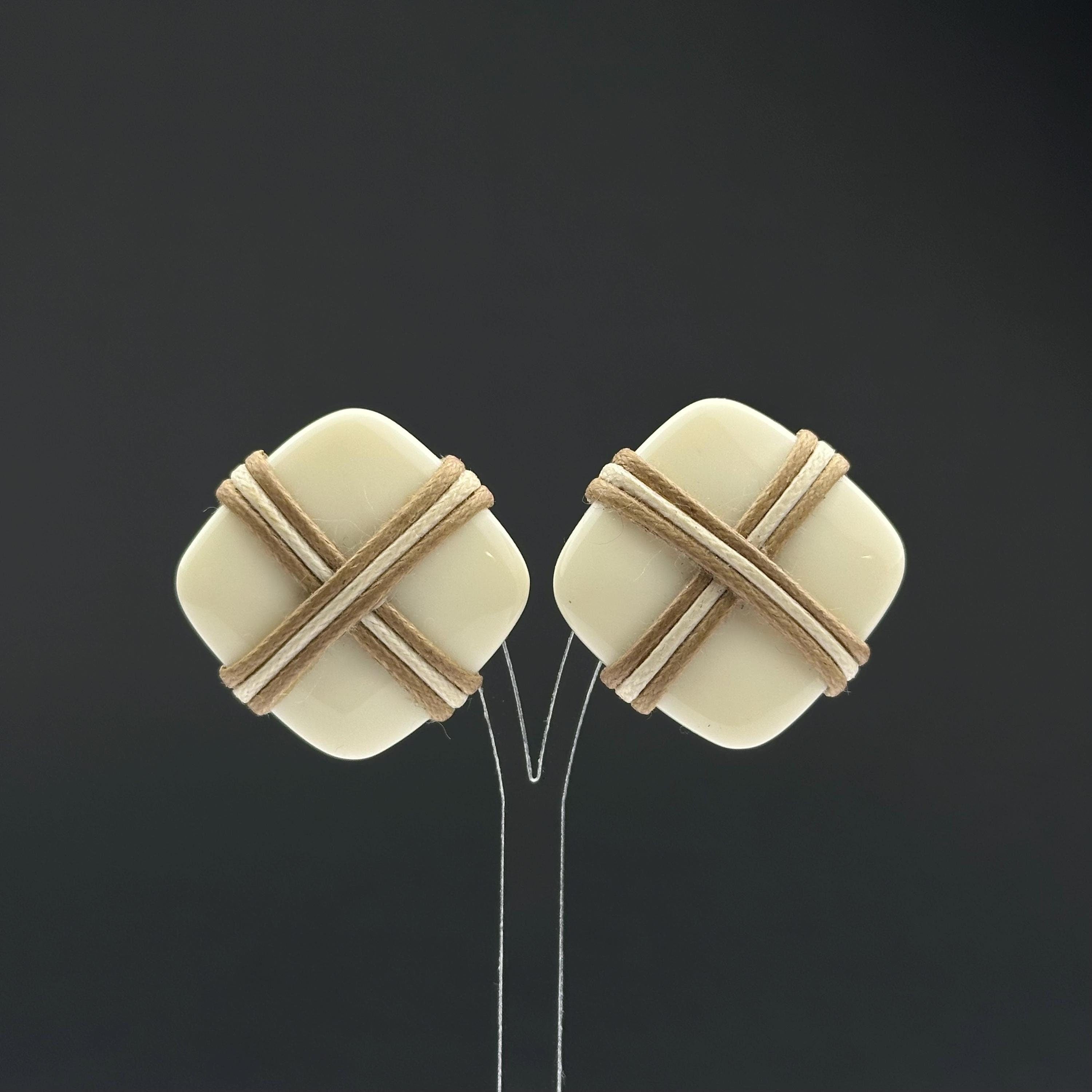 Vintage white plastic geometric clip on earrings