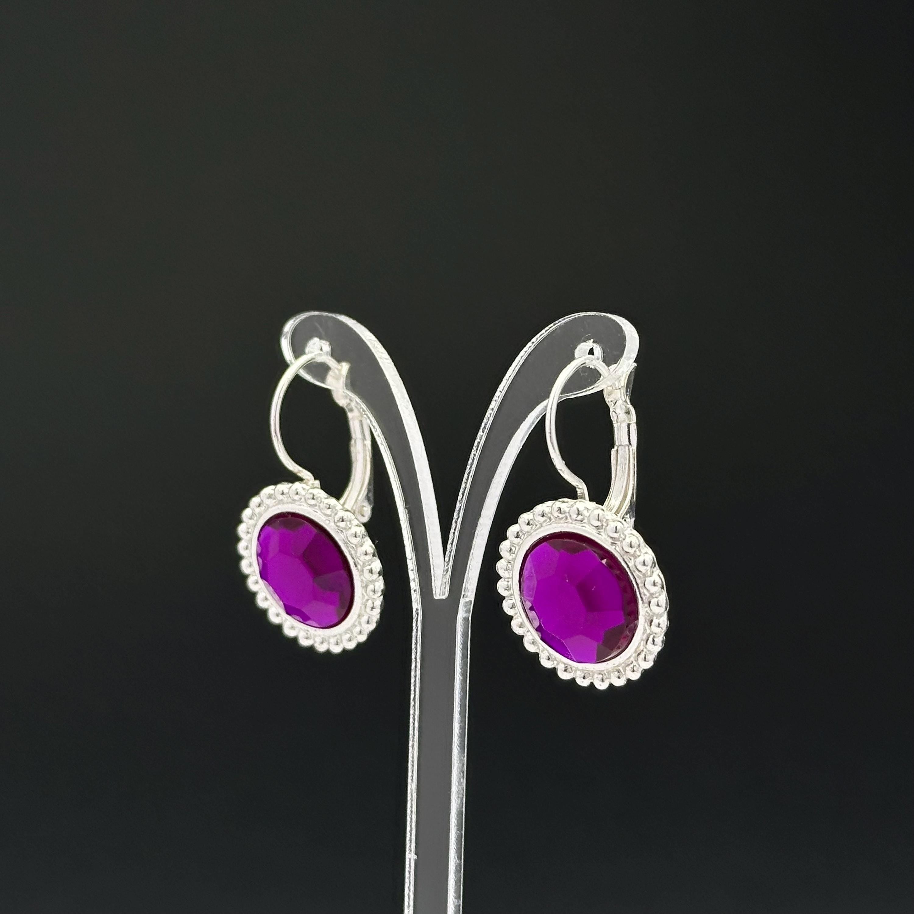 Vintage silver tone and purple plastic crystal openwork earrings