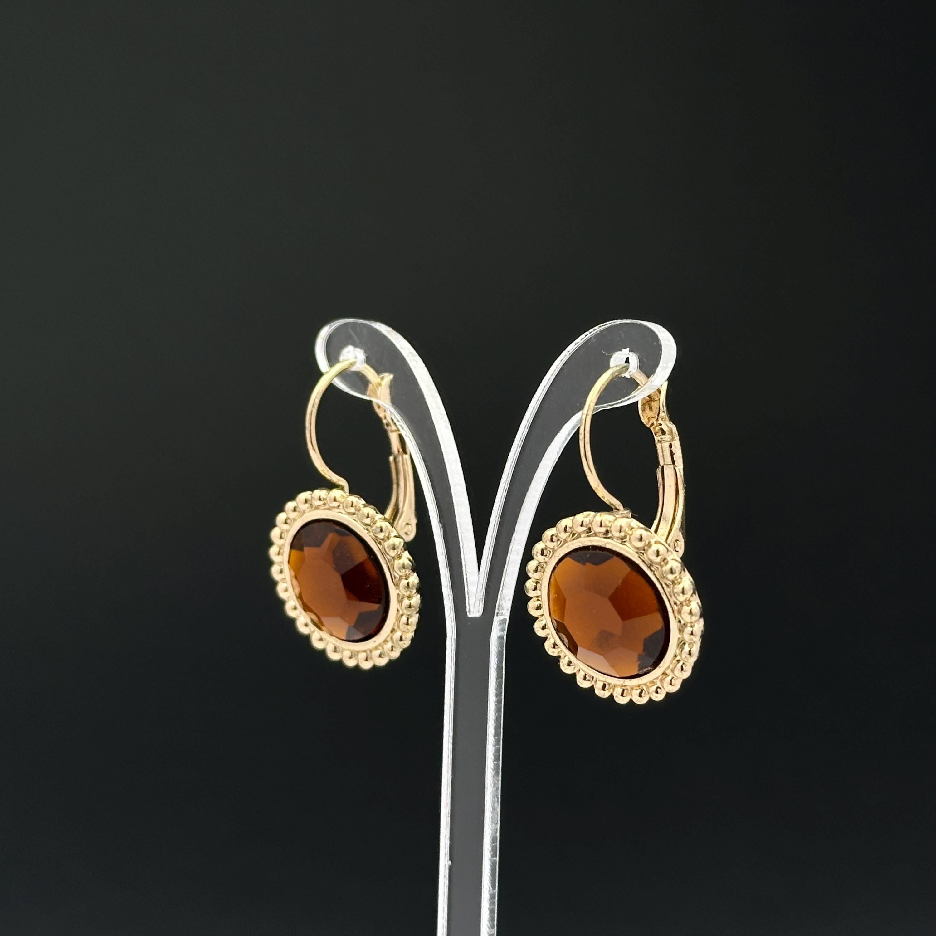 Vintage gold tone and brown plastic crystal openwork earrings