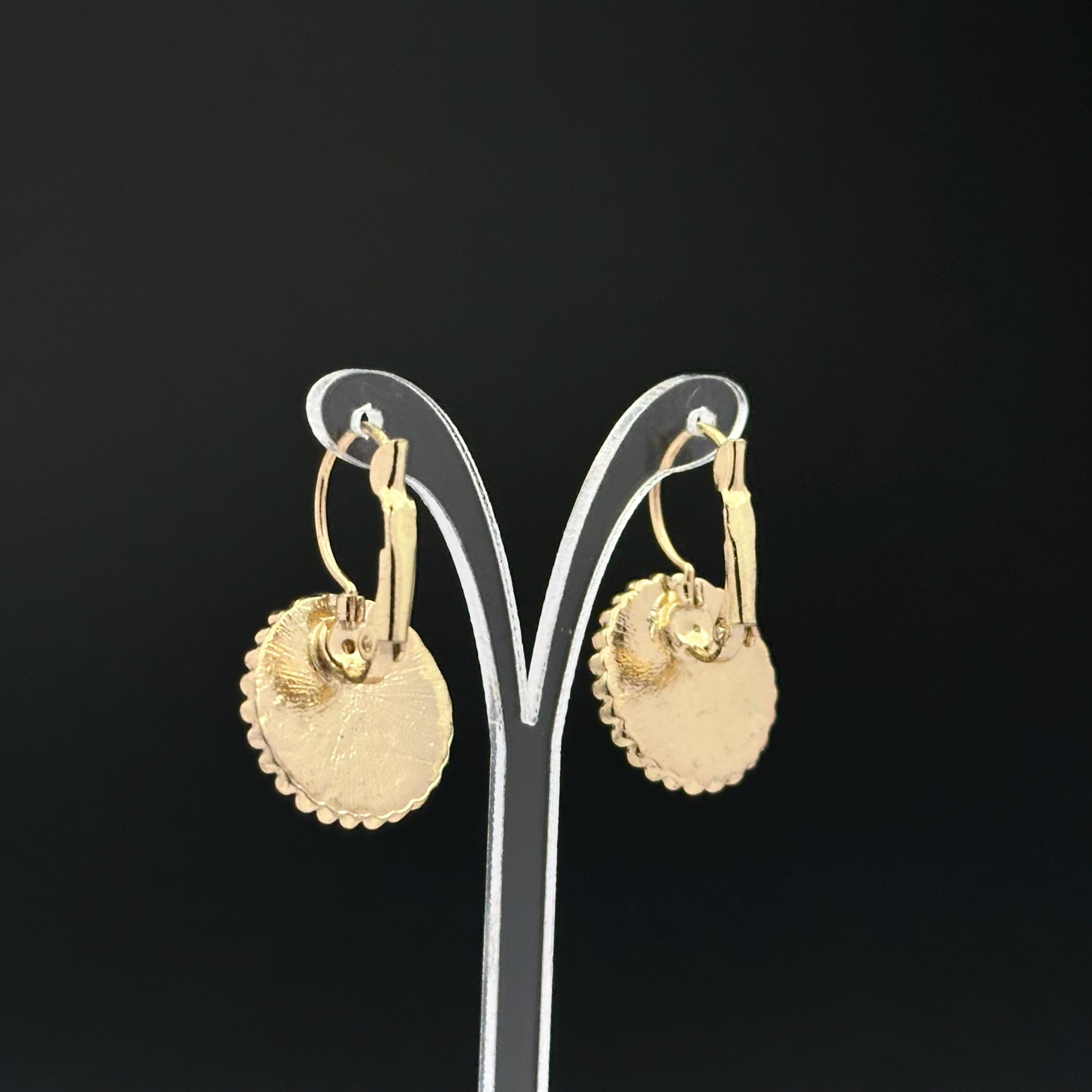 Vintage gold tone and brown plastic crystal openwork earrings