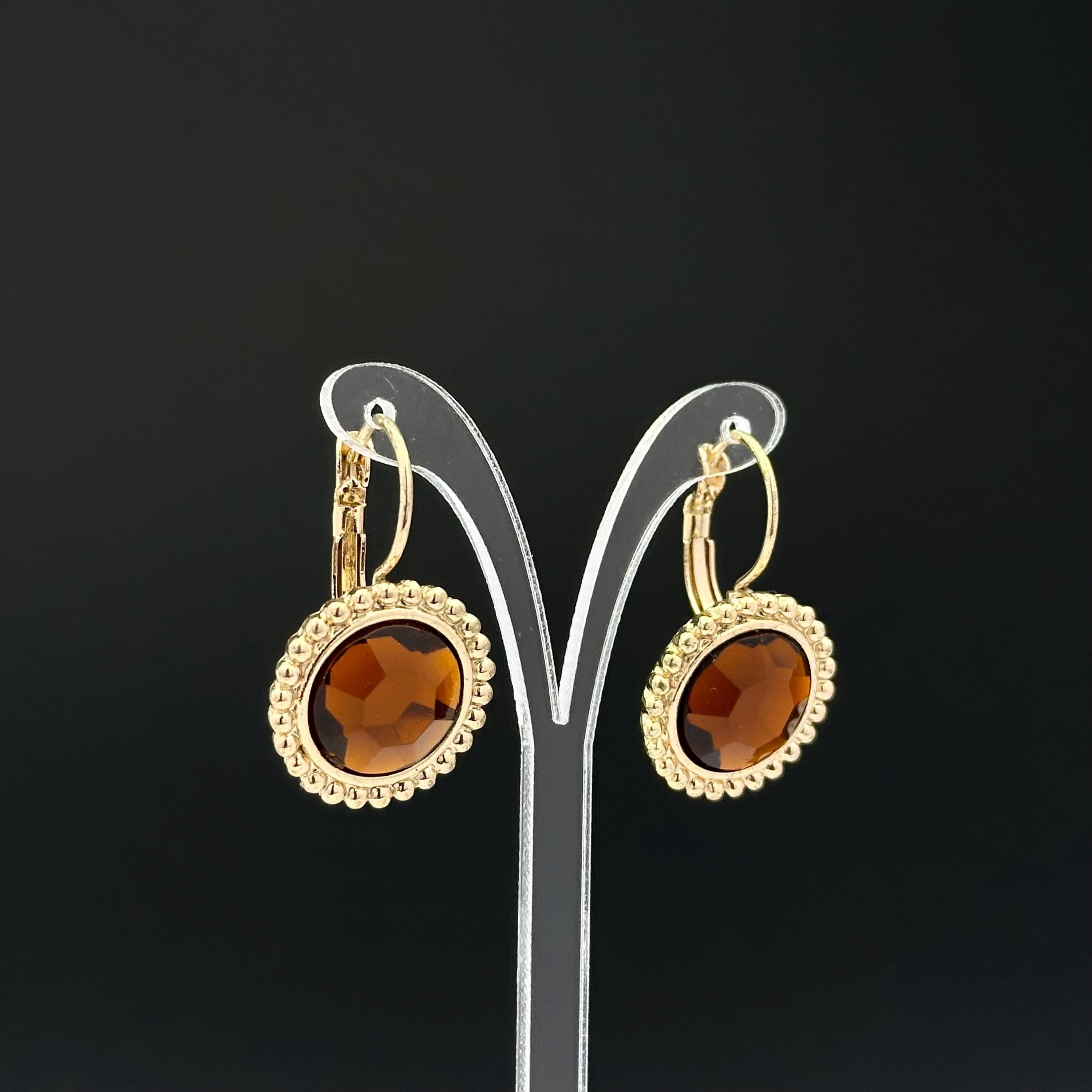 Vintage gold tone and brown plastic crystal openwork earrings