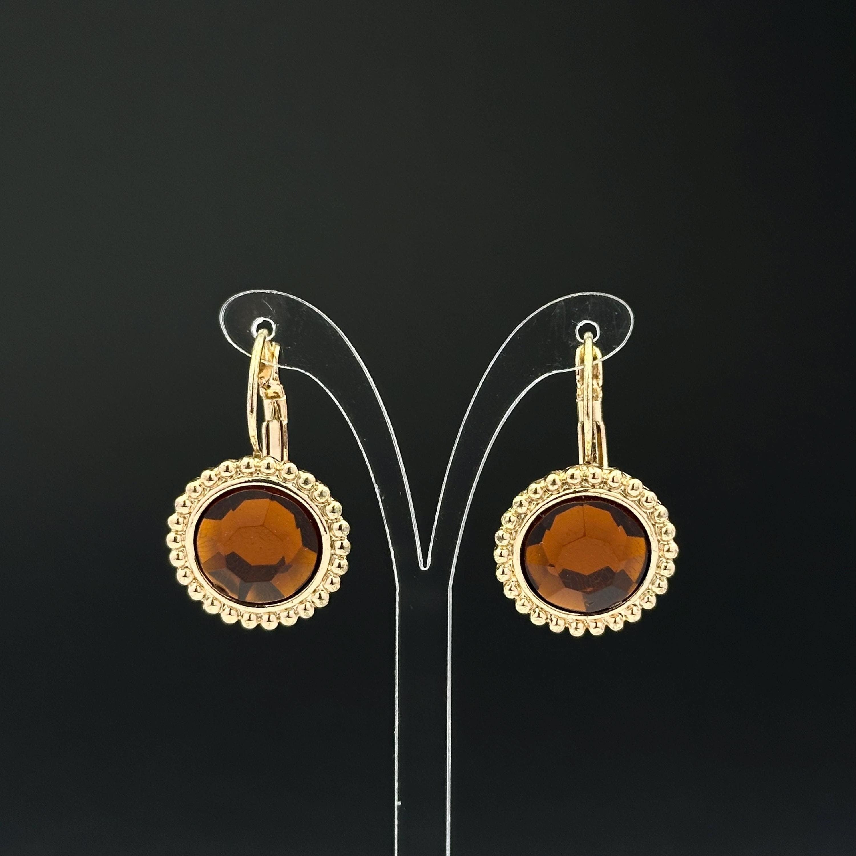 Vintage gold tone and brown plastic crystal openwork earrings