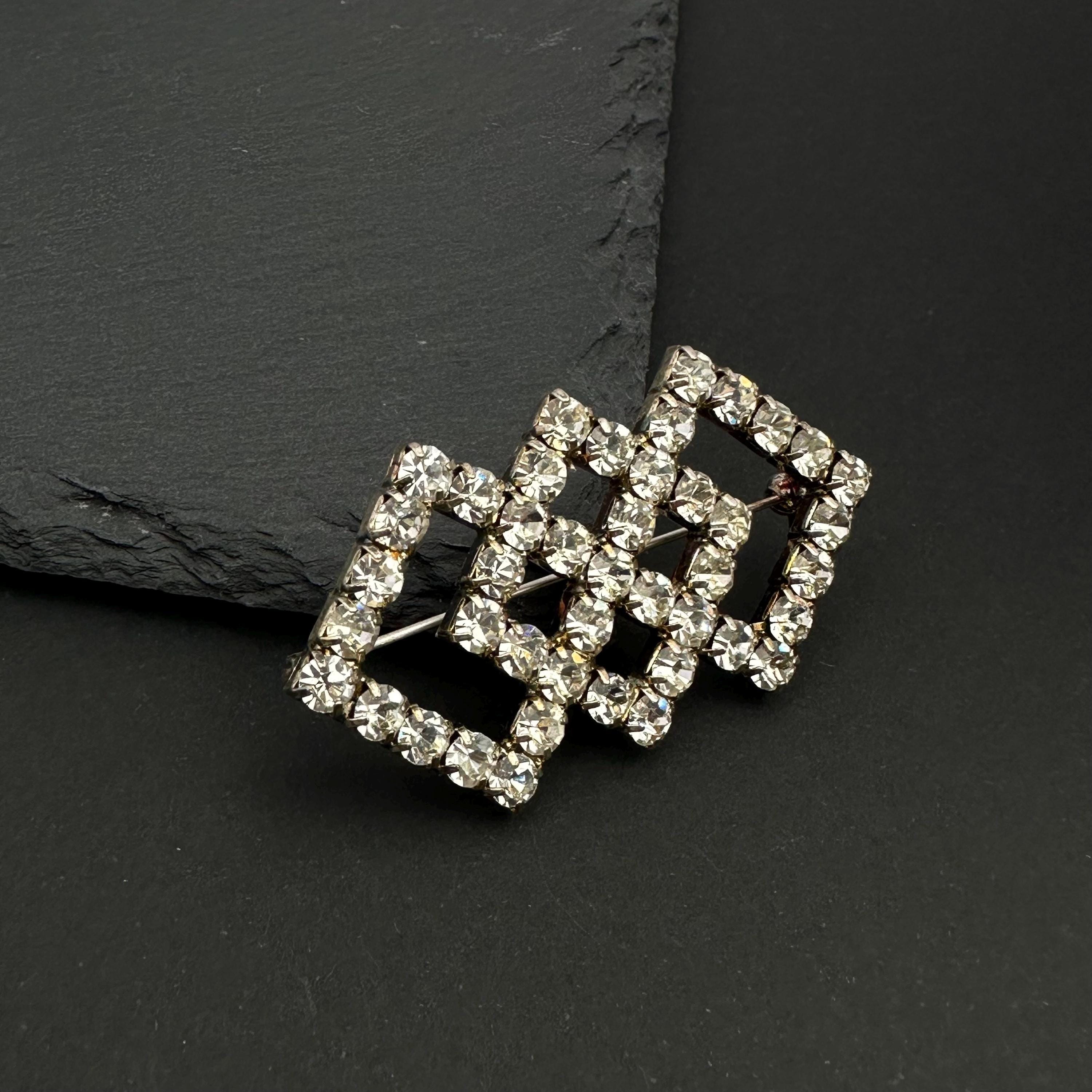 Vintage silver tone and rhinestone art deco brooch