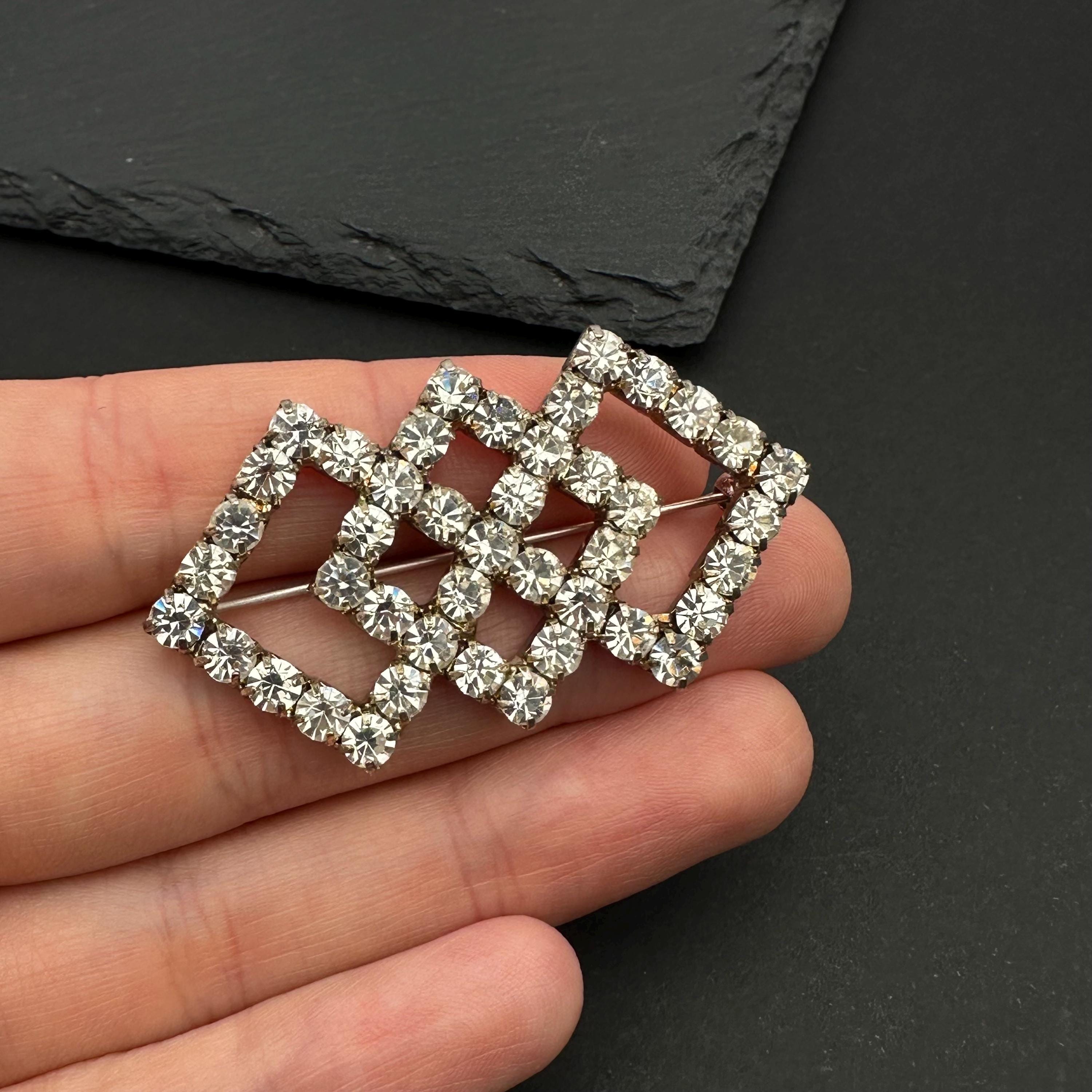 Vintage silver tone and rhinestone art deco brooch