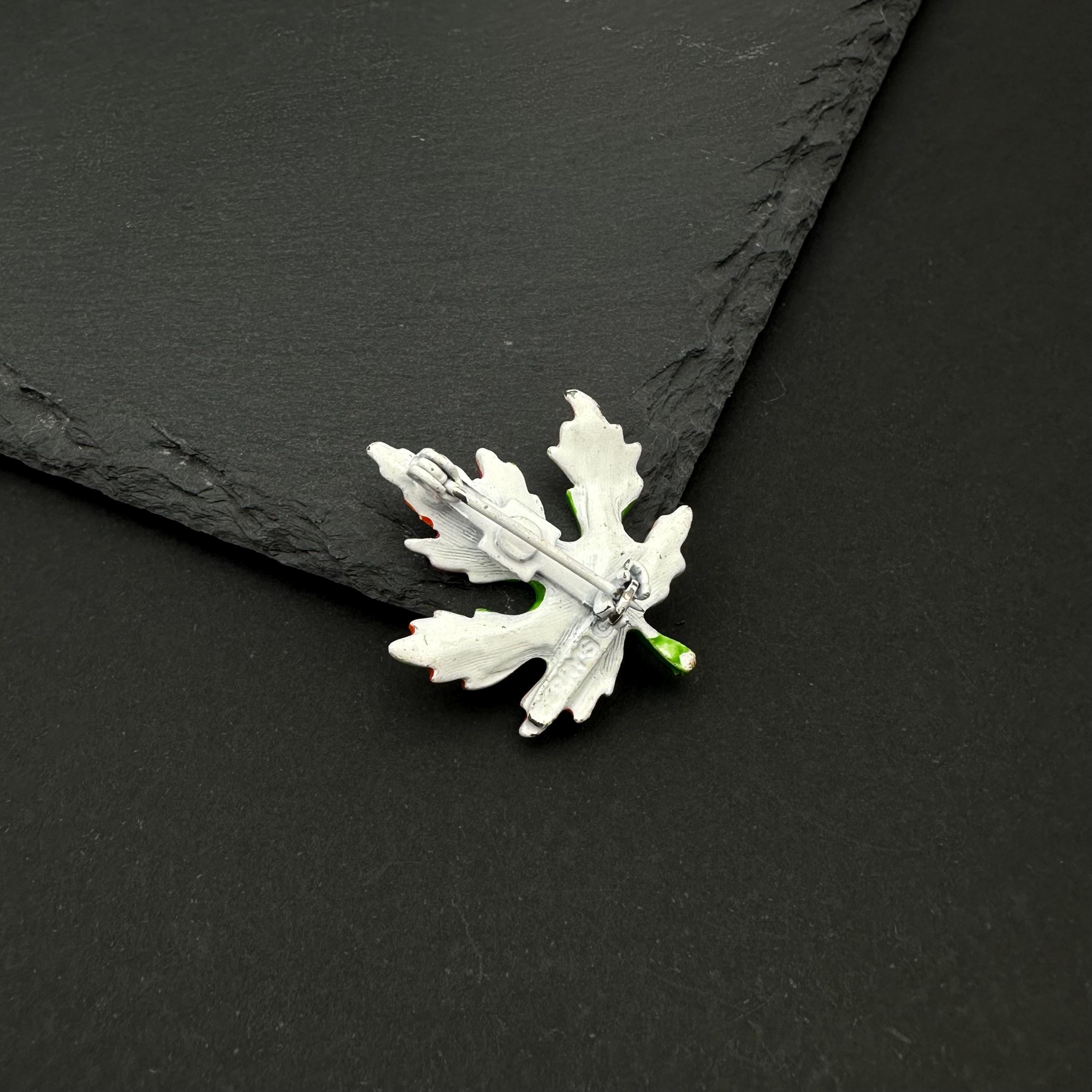 Vintage Gerry's enamel leaf brooch