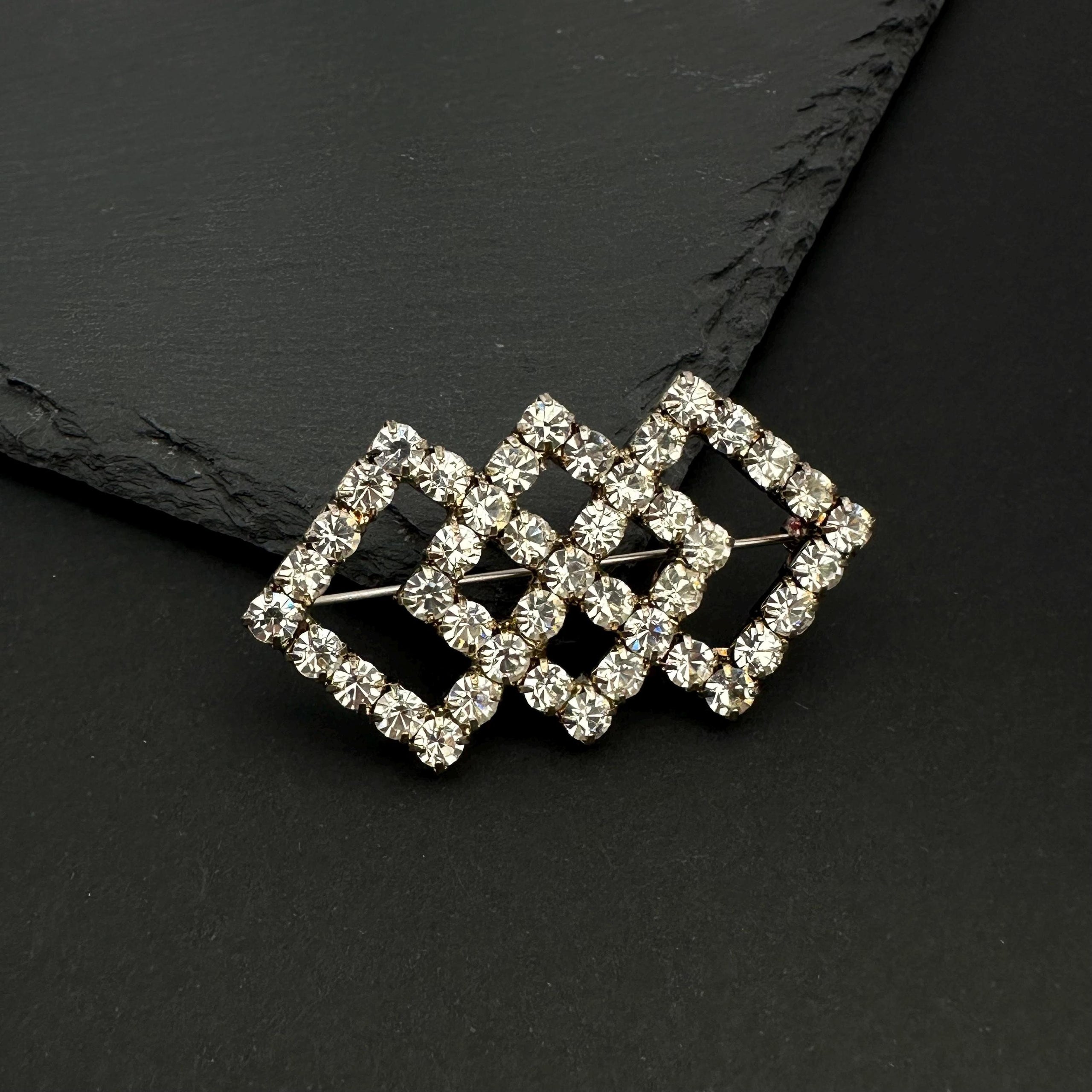 Vintage silver tone and rhinestone art deco brooch