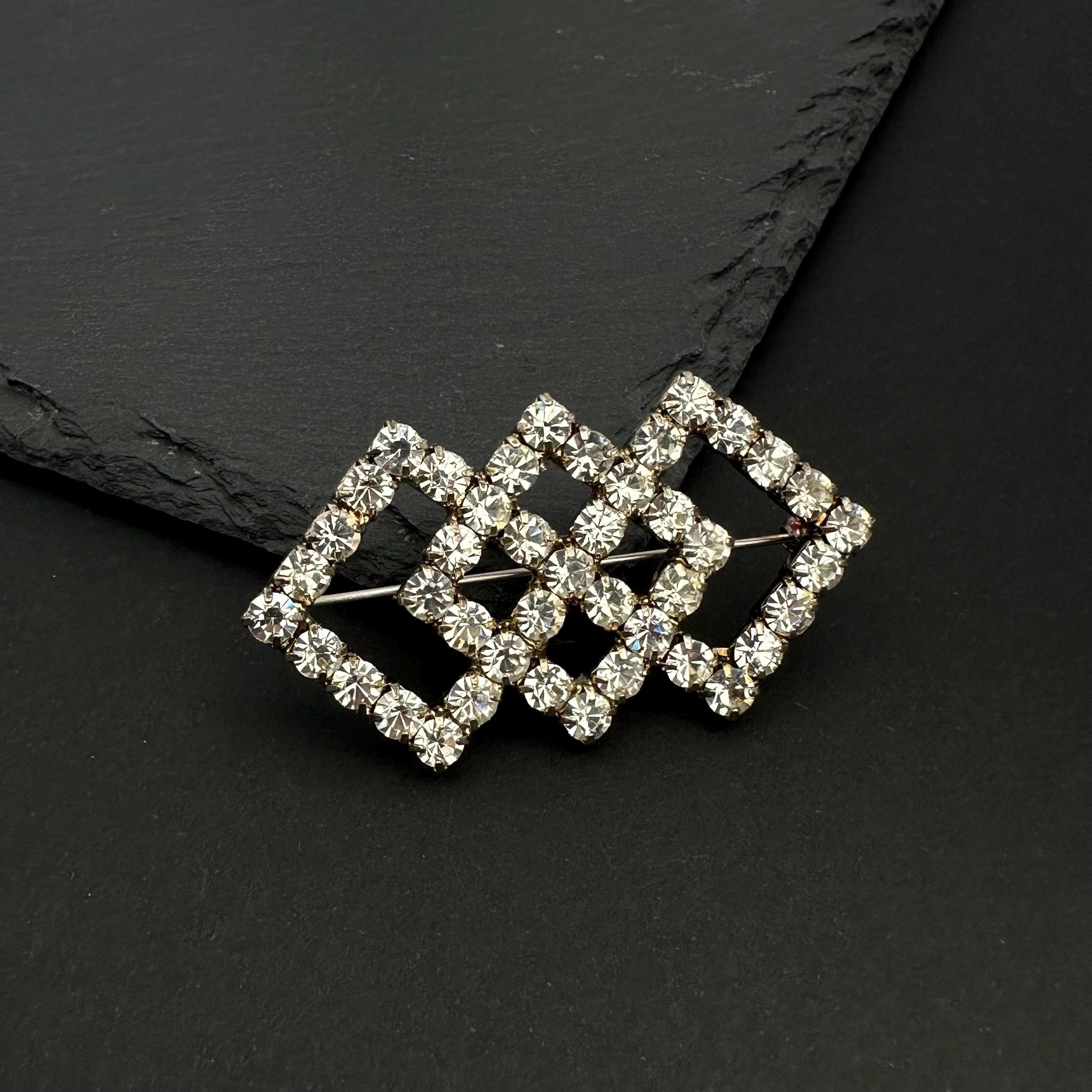 Vintage silver tone and rhinestone art deco brooch
