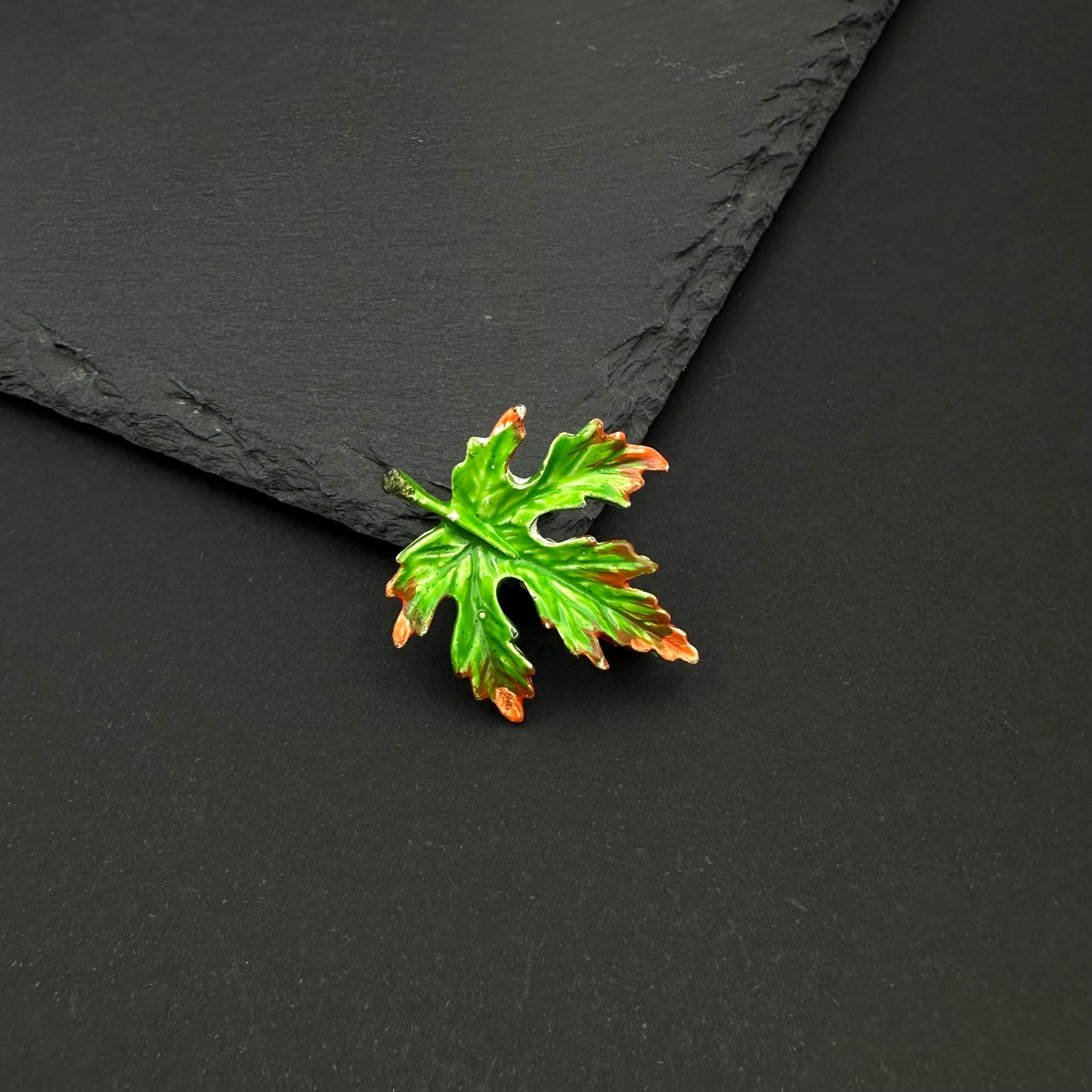 Vintage Gerry's enamel leaf brooch
