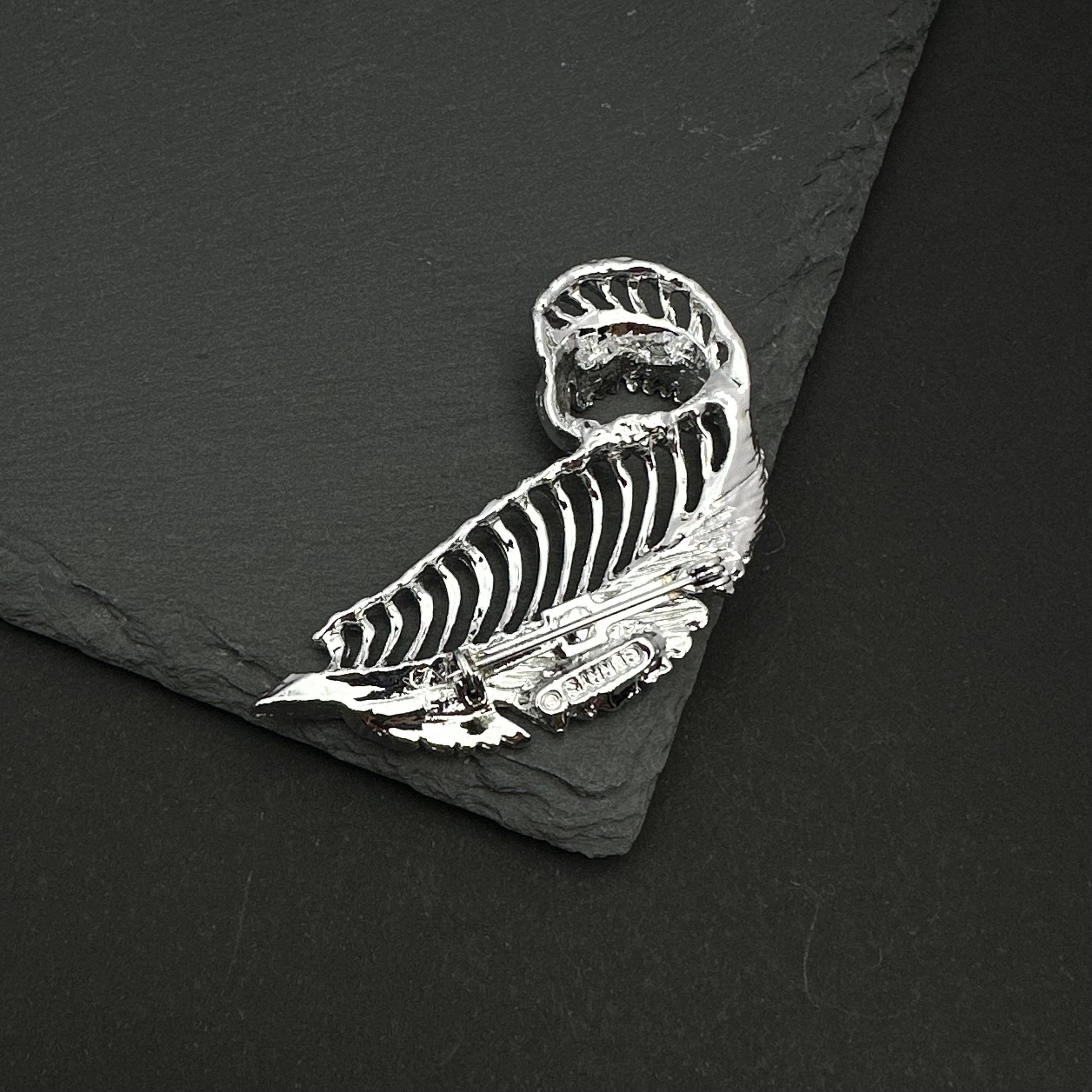 Vintage Gerry's silver tone feather brooch