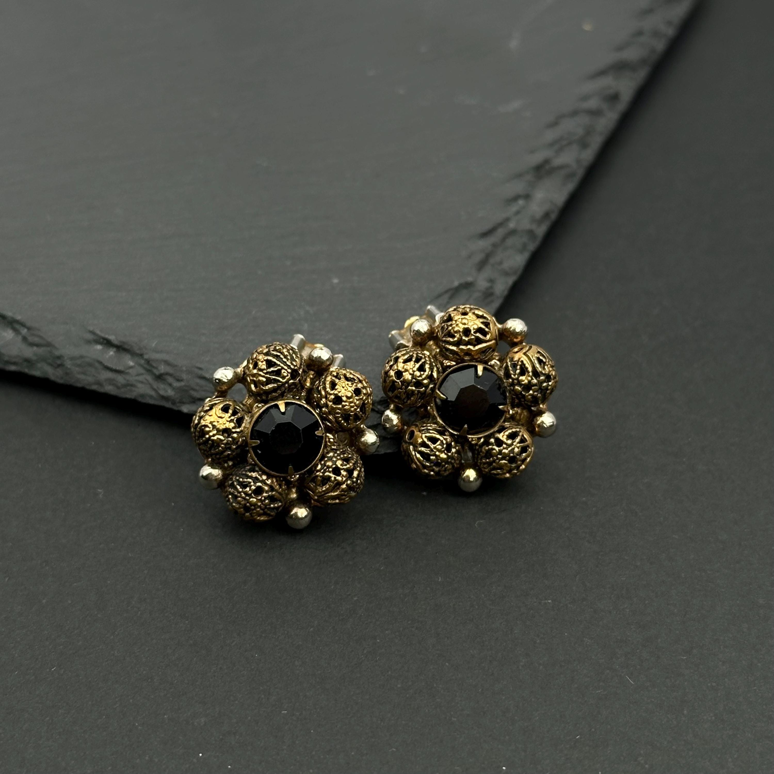 Vintage bronze tone and black crystal filigree clip-on earrings