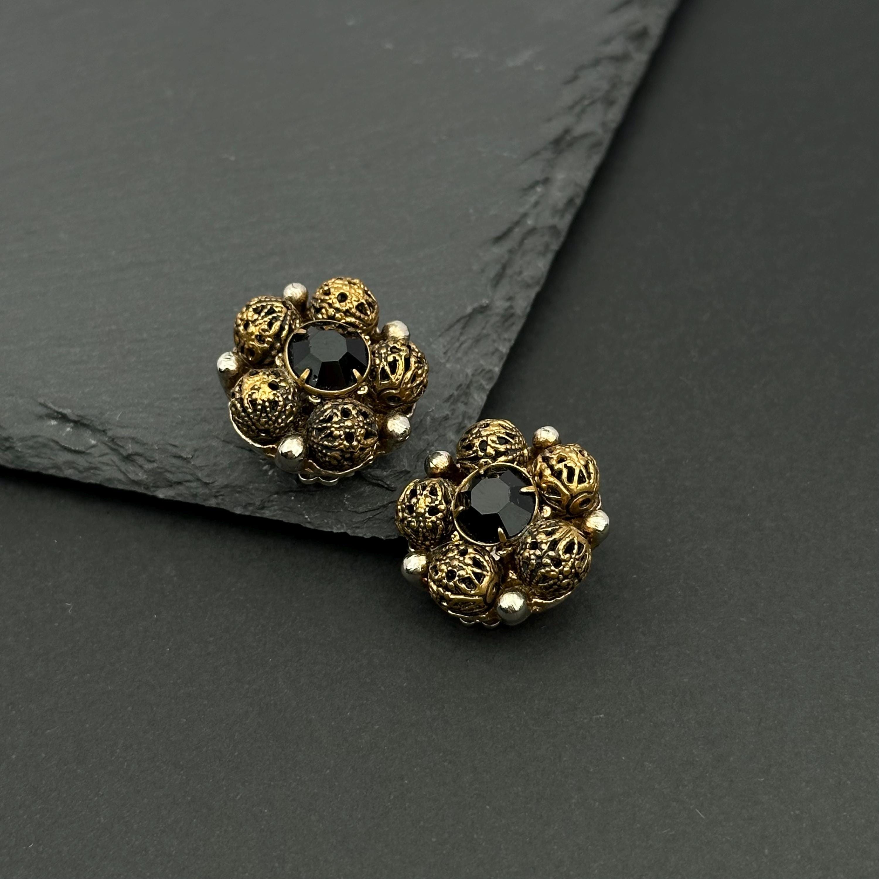 Vintage bronze tone and black crystal filigree clip-on earrings