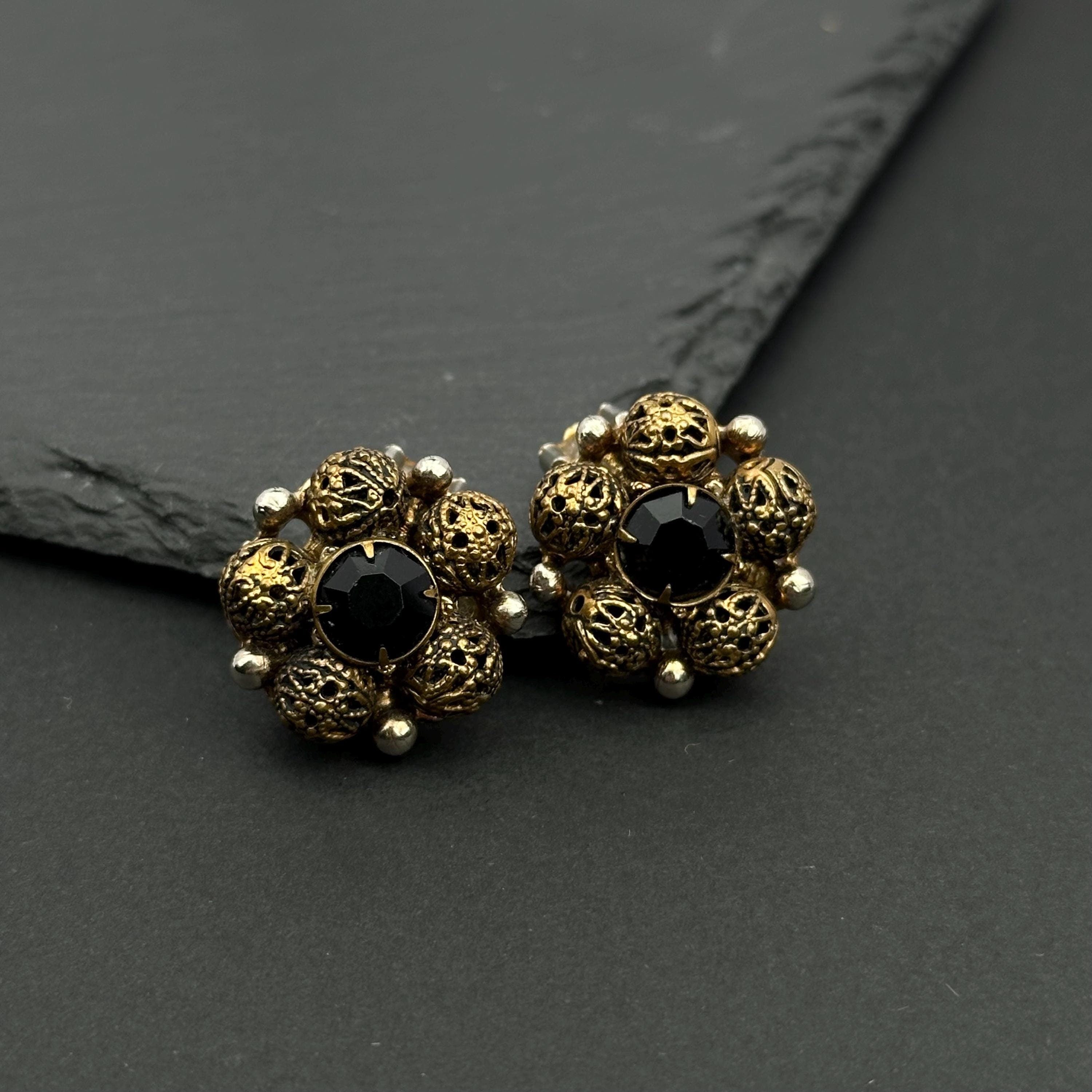 Vintage bronze tone and black crystal filigree clip-on earrings