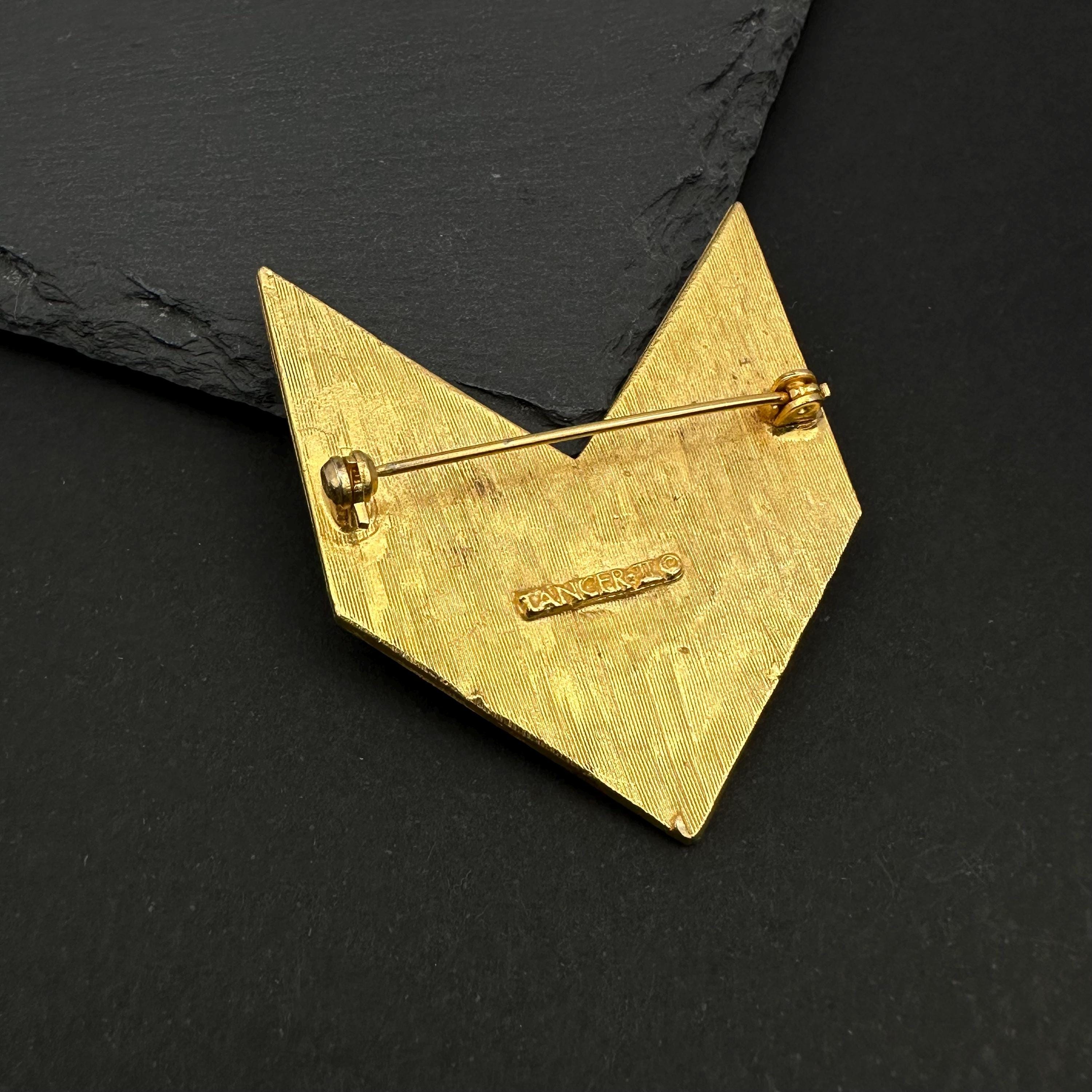 Vintage Tancer & Two gold tone, enamel and rhinestone chevron brooch