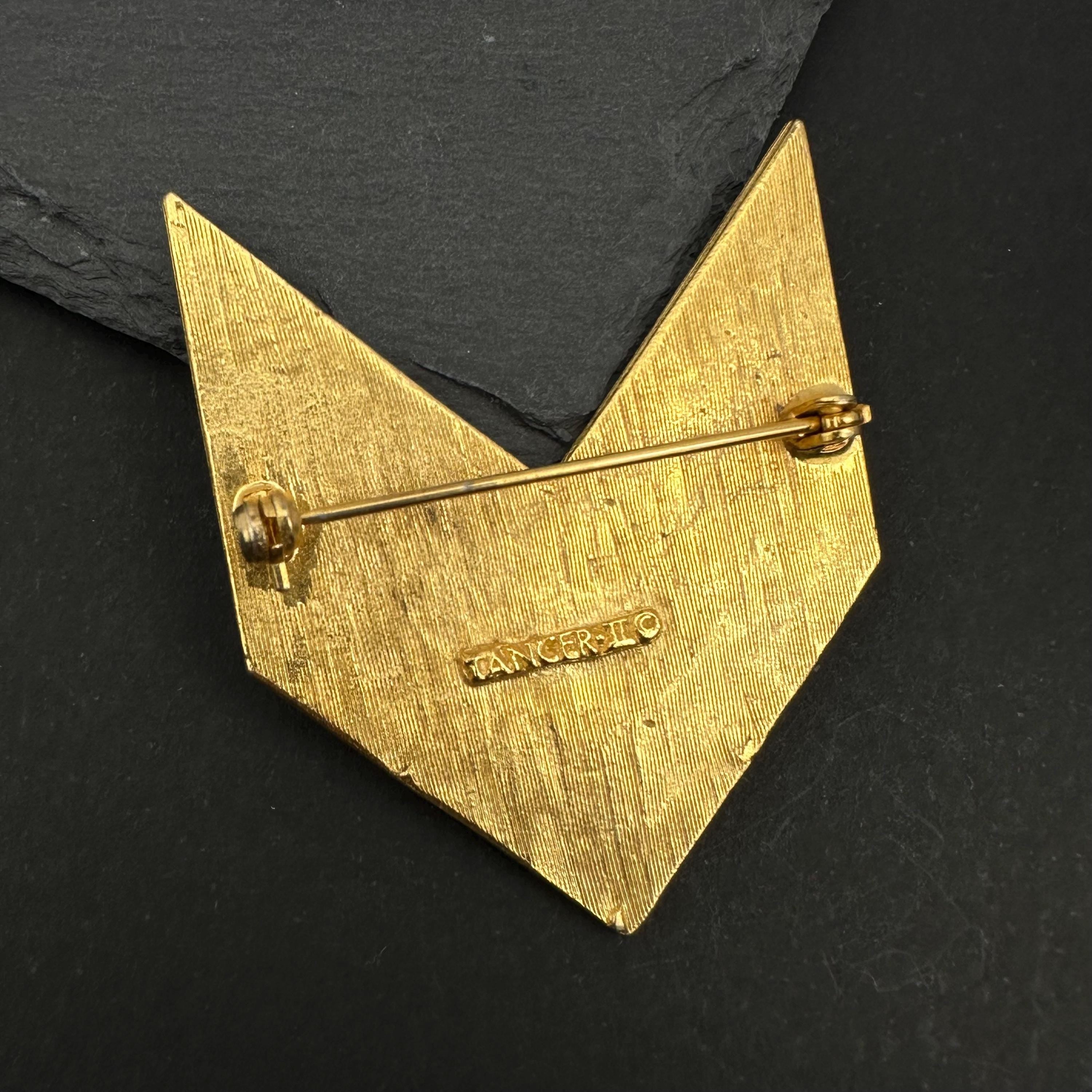 Vintage Tancer & Two gold tone, enamel and rhinestone chevron brooch