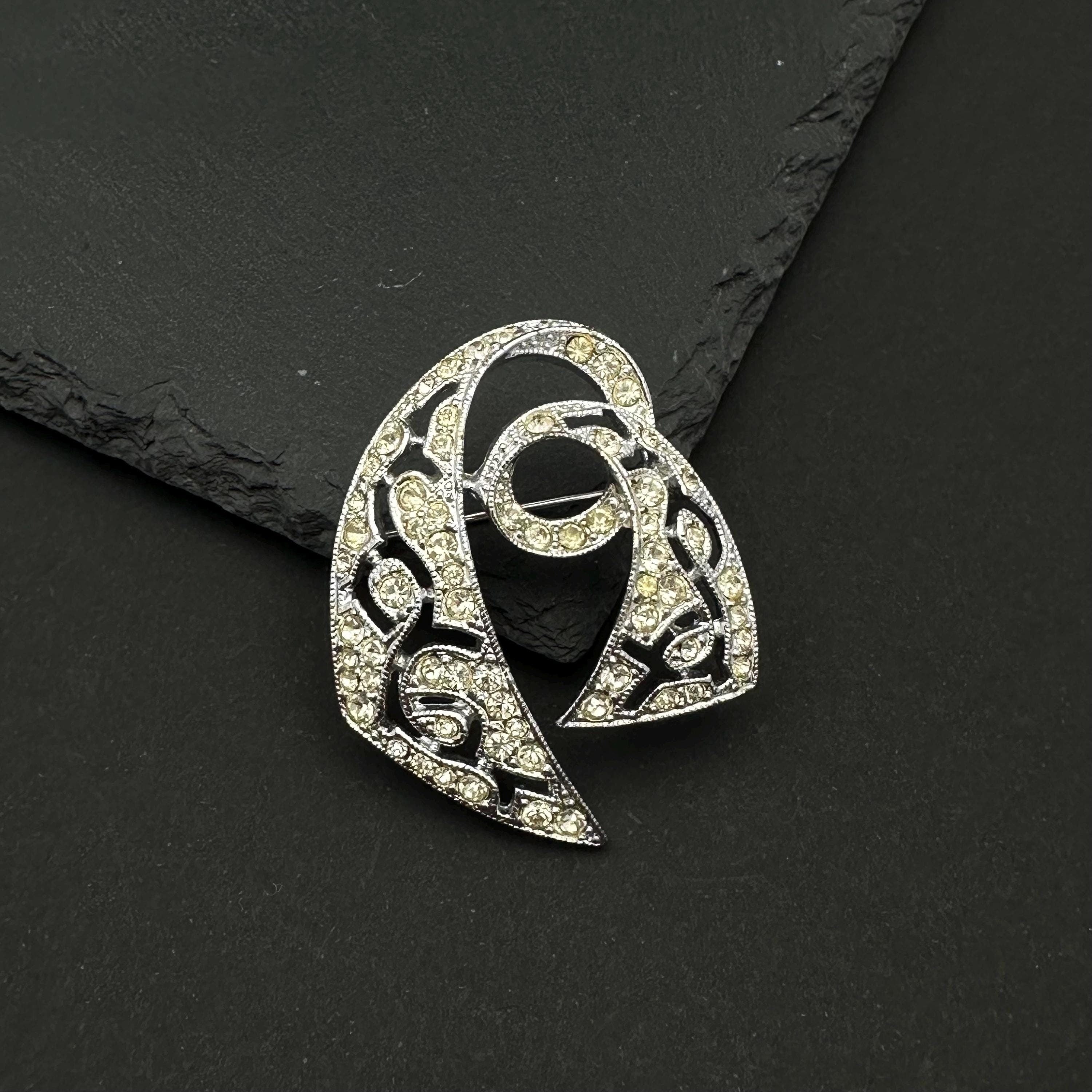Vintage EMMONS silver tone and rhinestone brooch