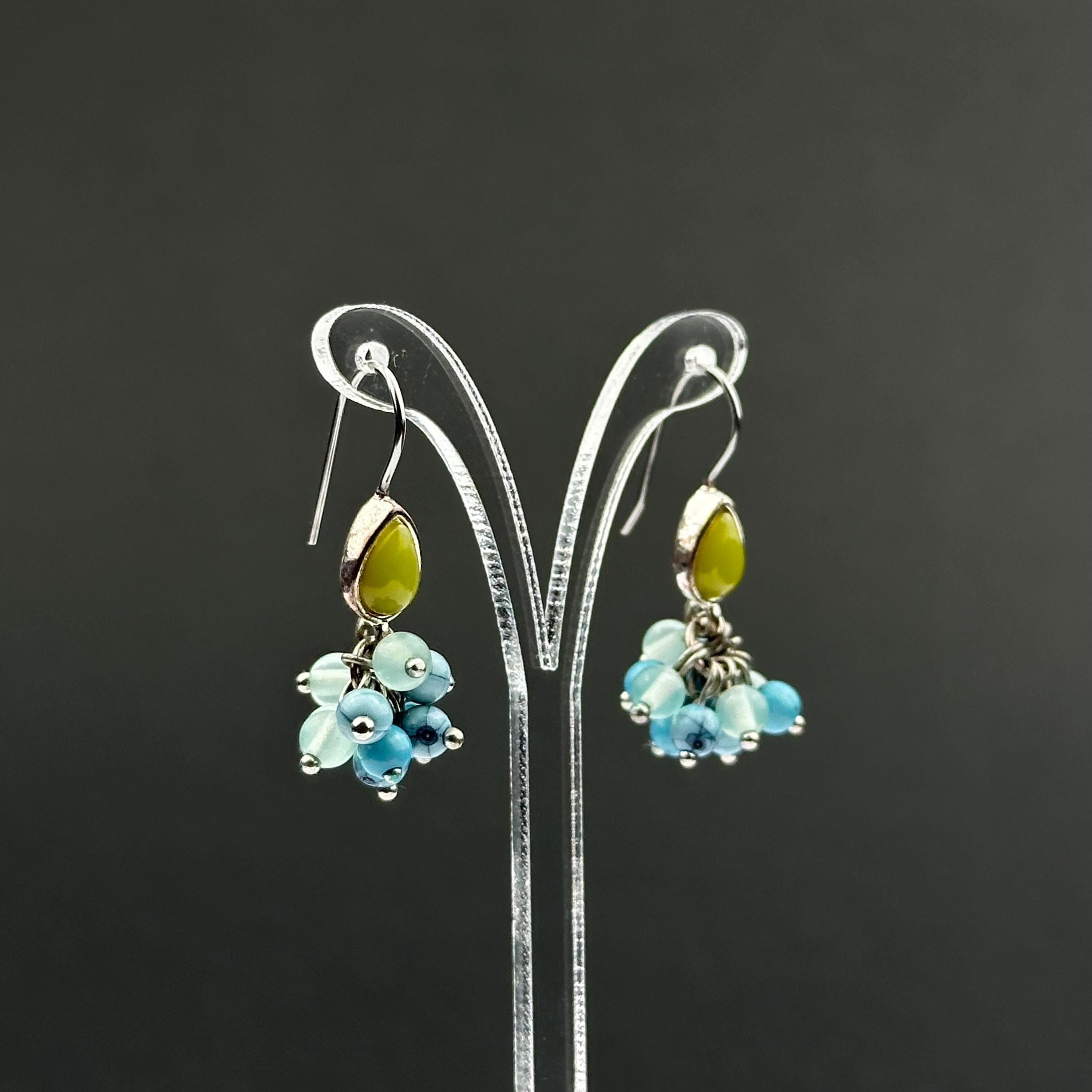 Vintage Monet drop earrings with green and blue bead