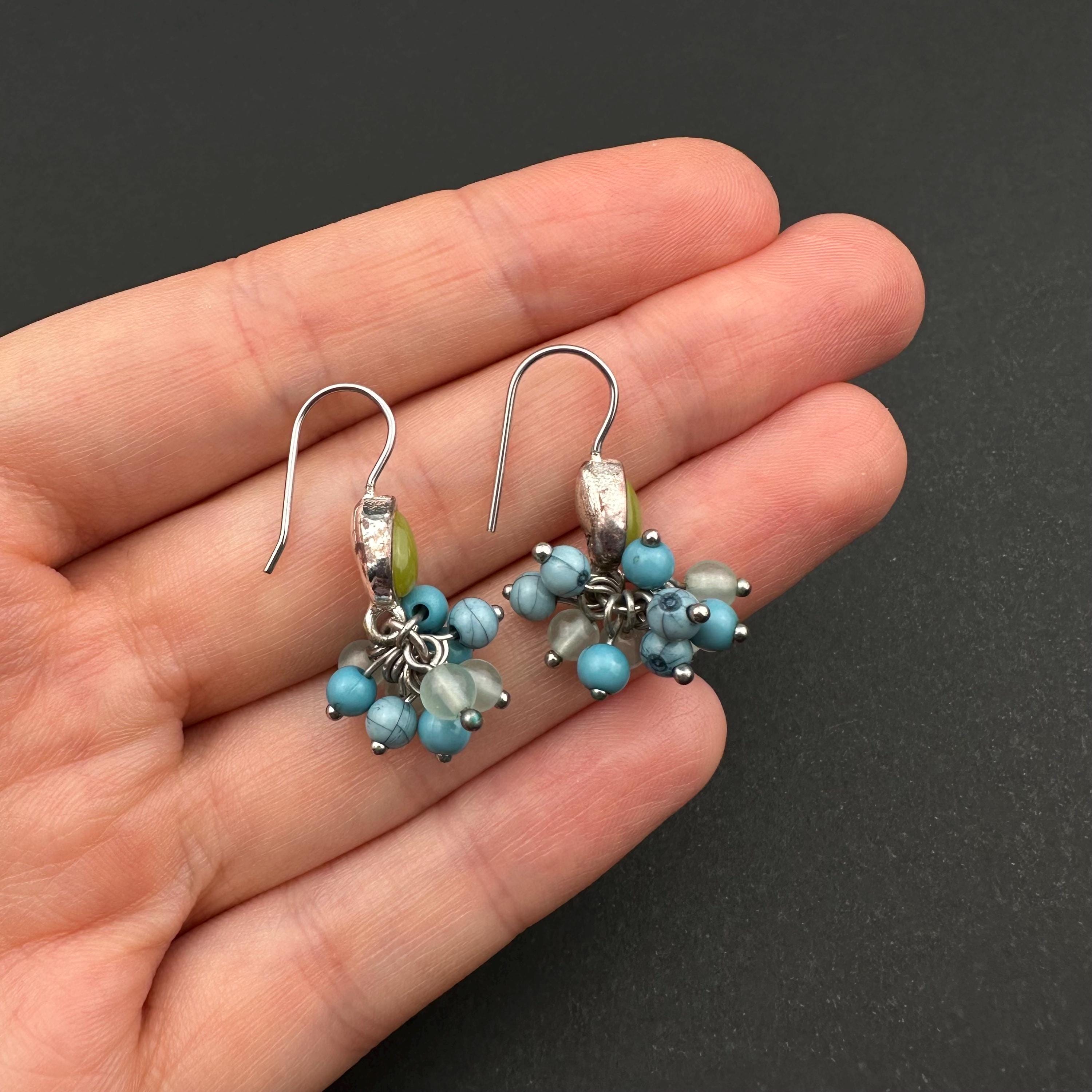 Vintage Monet drop earrings with green and blue bead