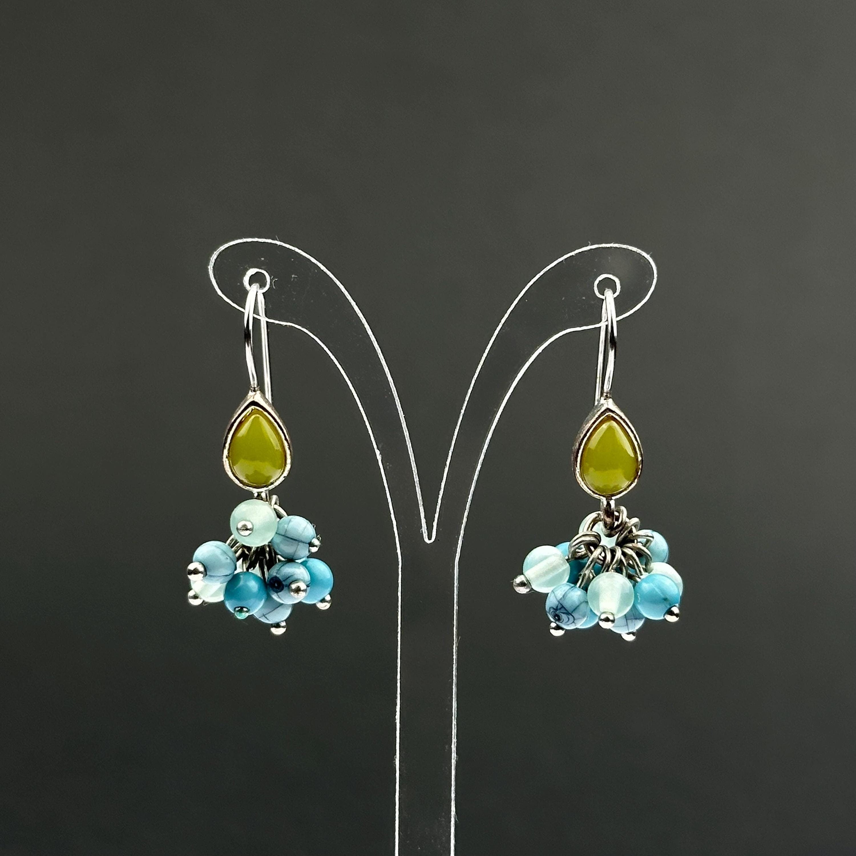 Vintage Monet drop earrings with green and blue bead