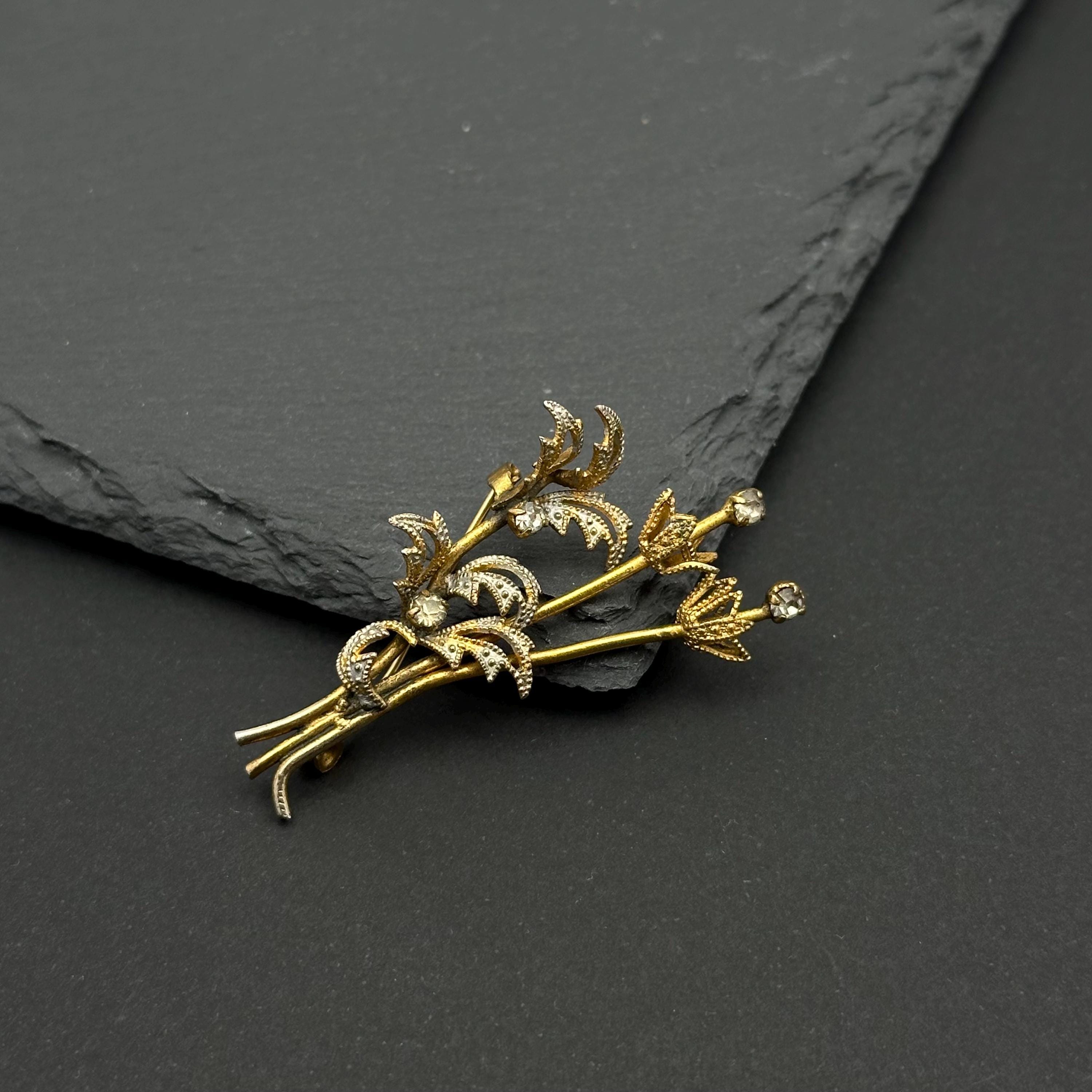Vintage gold tone and crystal bouquet brooch