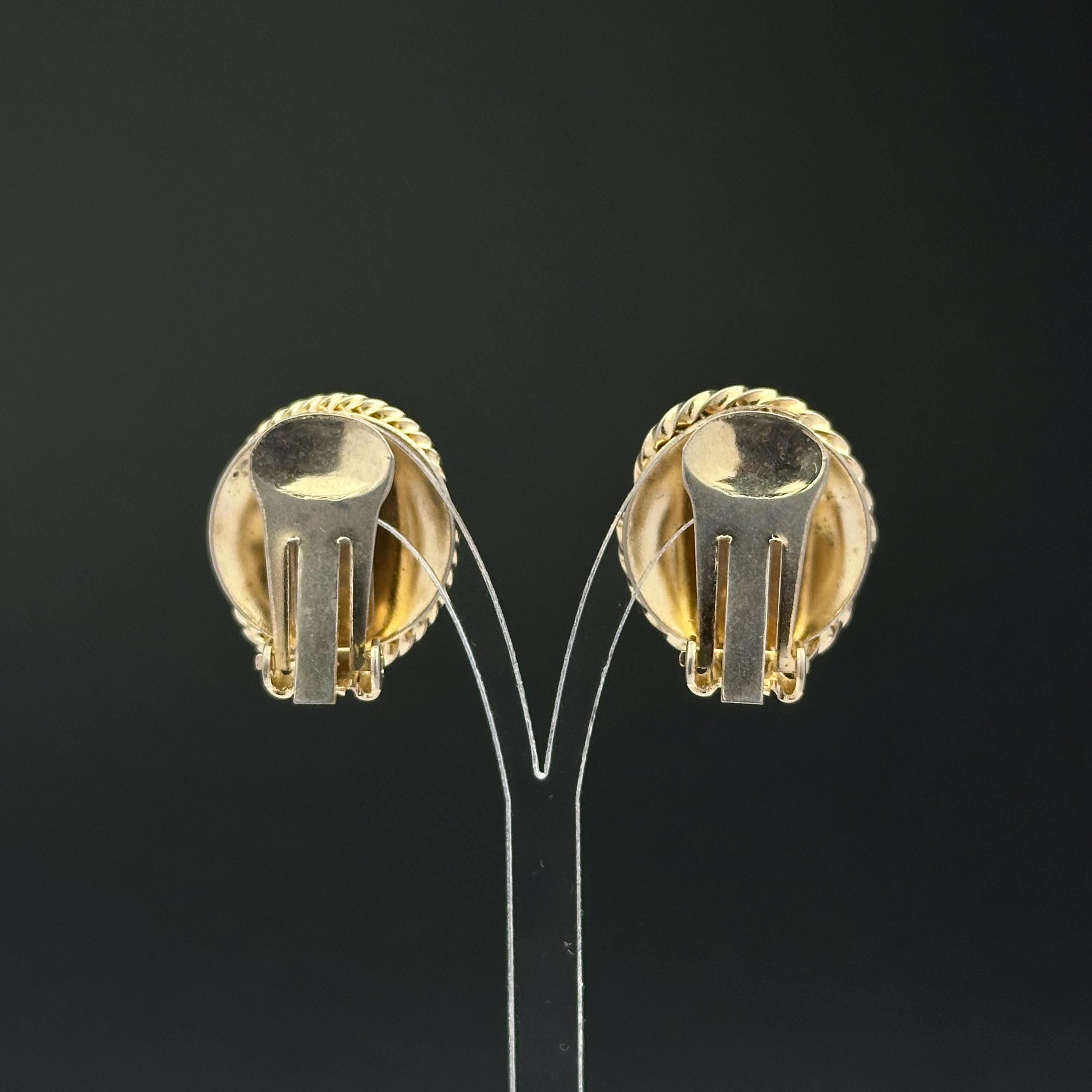 Vintage gold tone oval clip on earrings