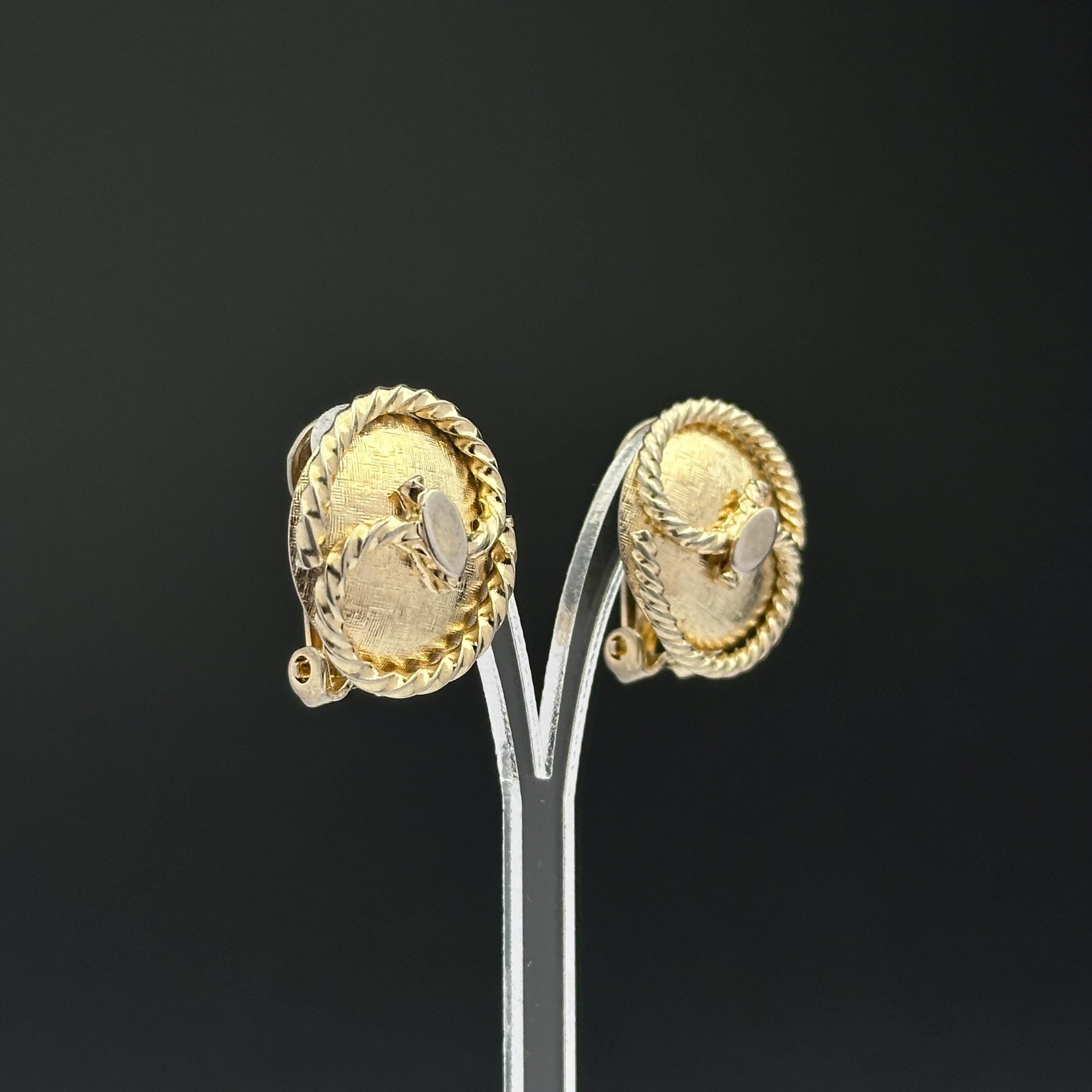 Vintage gold tone oval clip on earrings