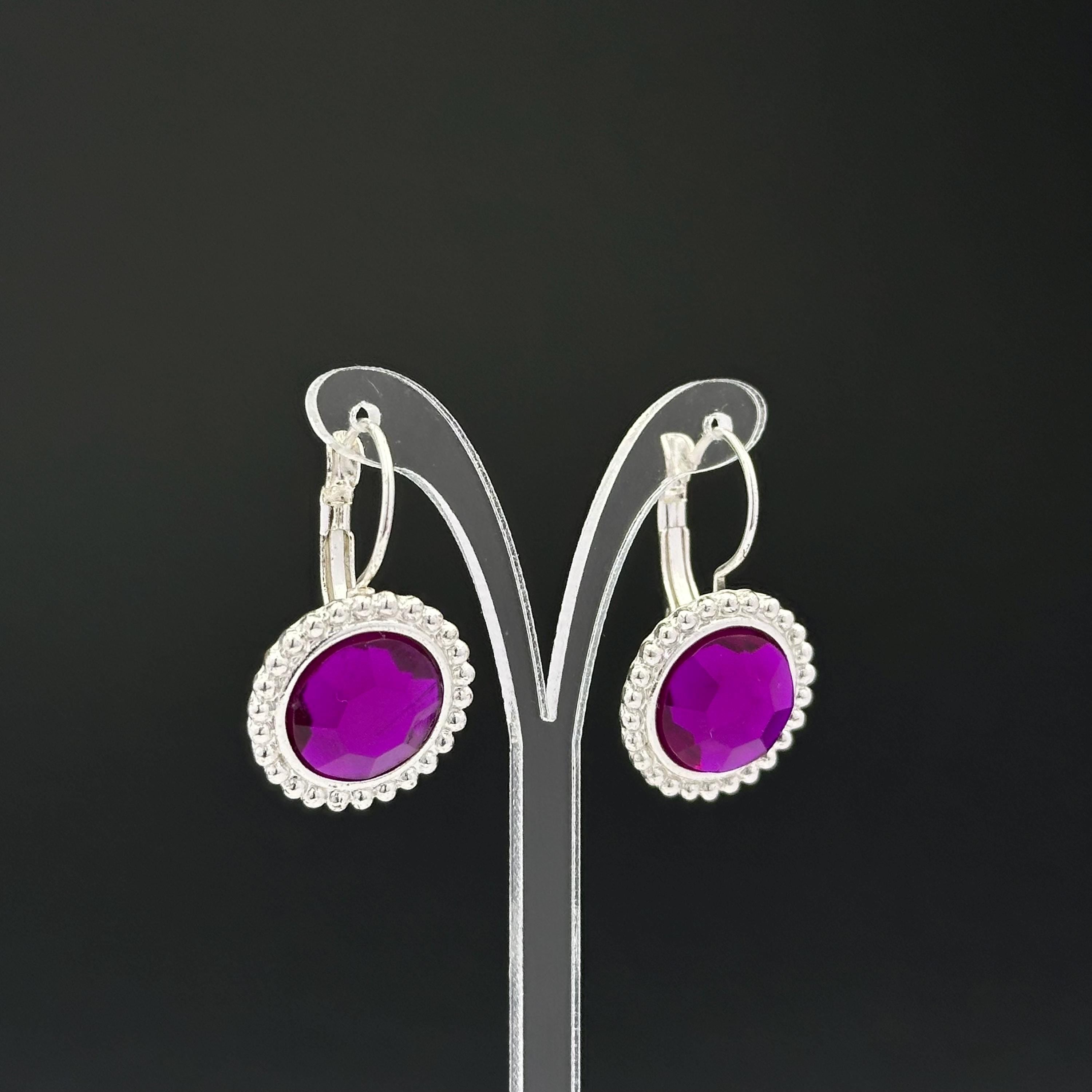Vintage silver tone and purple plastic crystal openwork earrings