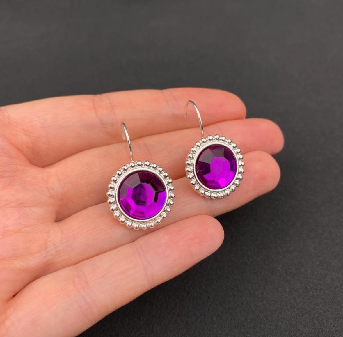 Vintage silver tone and purple plastic crystal openwork earrings
